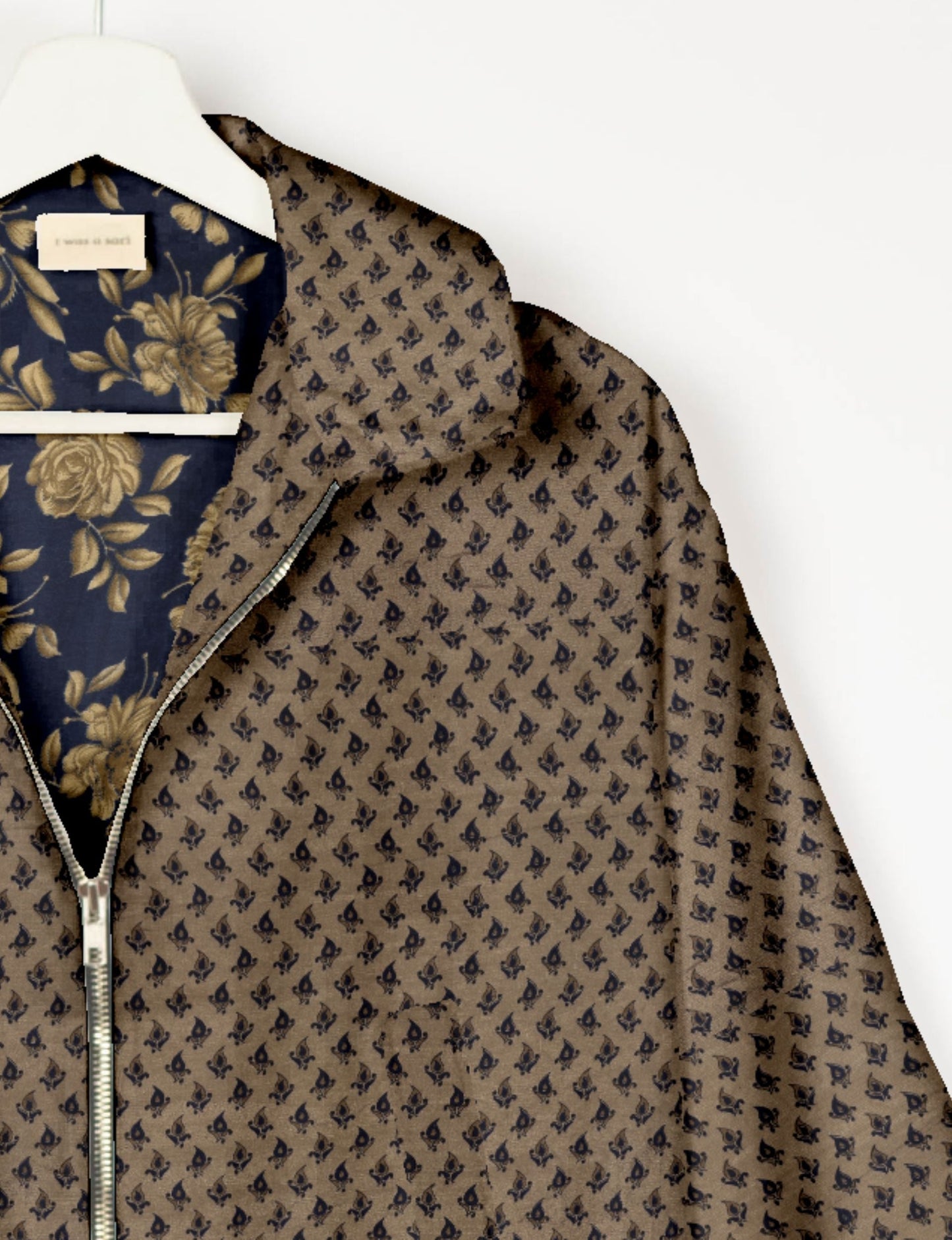 Upcycled Bomber Jacket made from recycled sari materials, featuring a cute cropped shape, elasticated hem and cuffs, and contrast sari print lining. Sustainable apparel promoting eco-friendly fashion and ethical clothing.