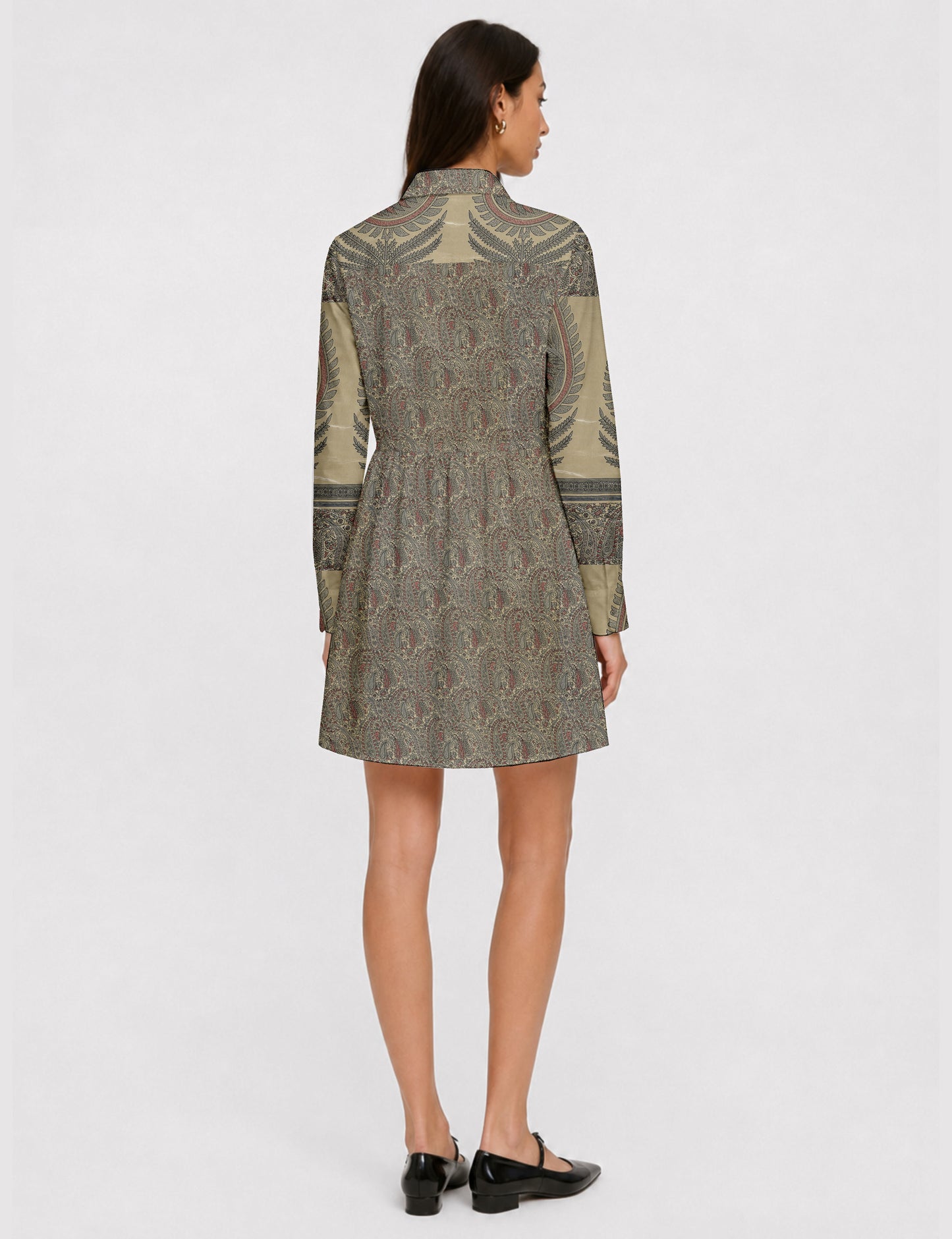 Short shirt dress with a relaxed A-line silhouette, point collar, partial button placket, gathered waist, side pockets, and full-length cuffed sleeves.