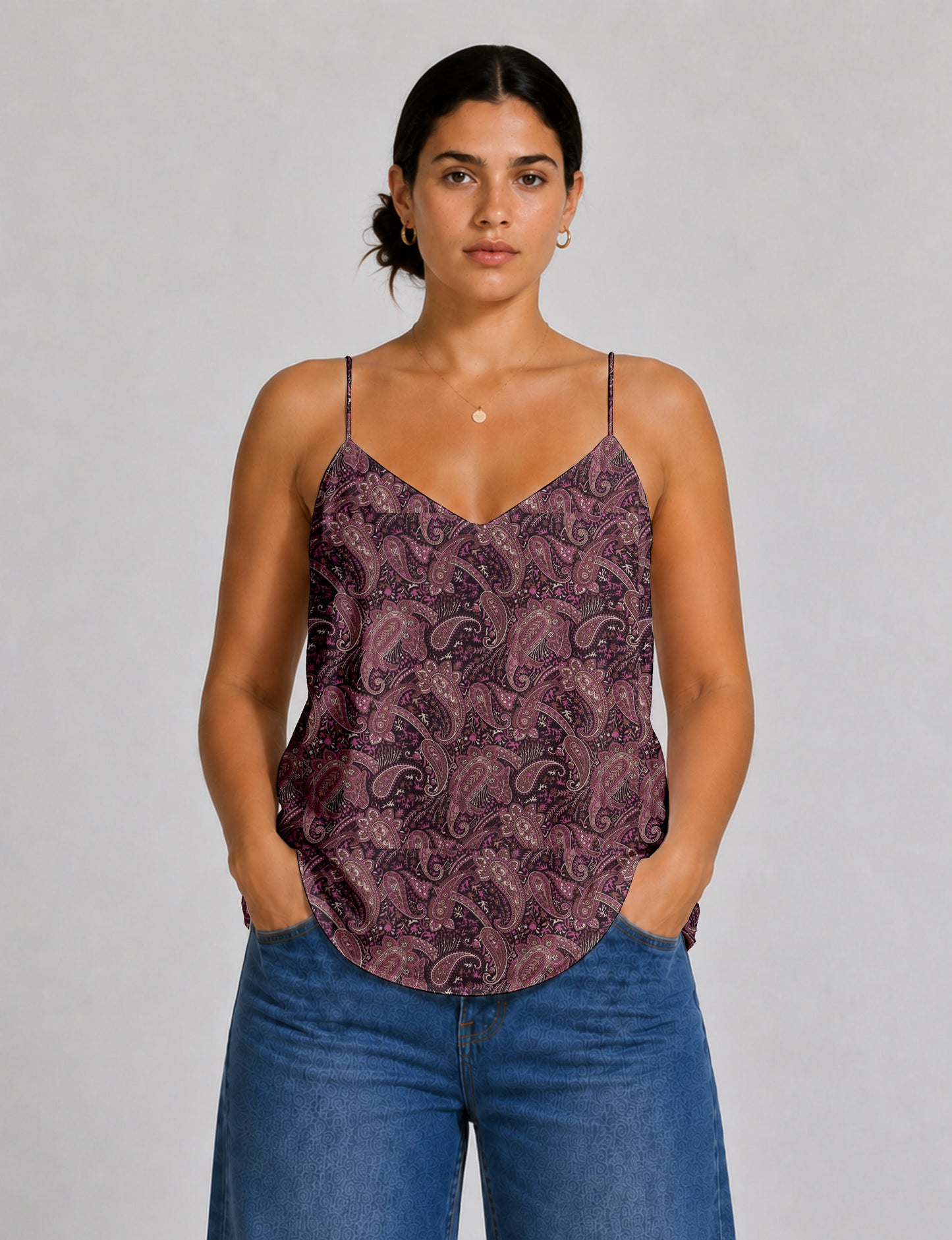 Women's sleeveless slip top with a relaxed straight fit, soft V-neckline, deep V-back, and delicate spaghetti straps.