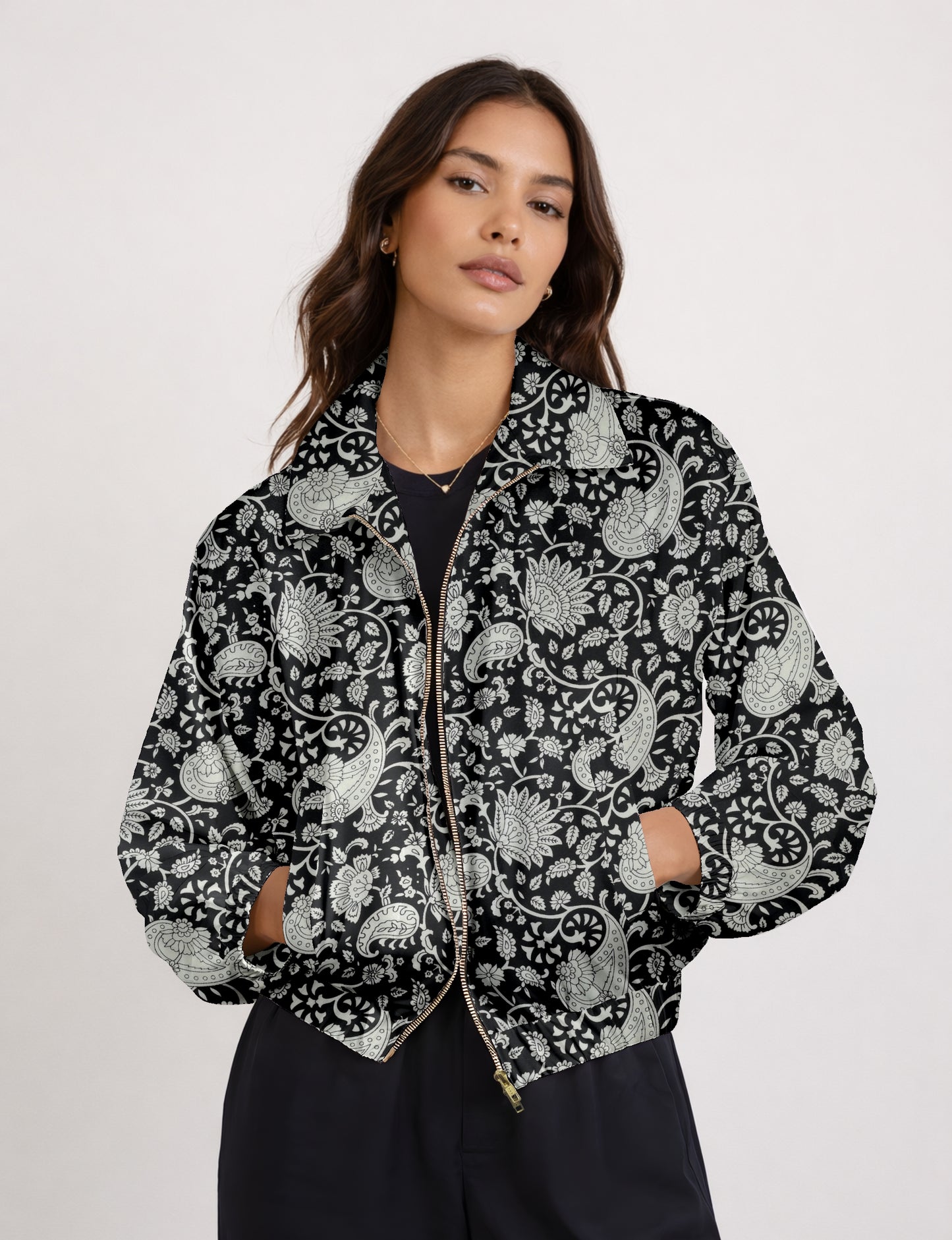 Upcycled Bomber Jacket made from recycled sari materials, featuring a cute cropped shape, elasticated hem and cuffs, and contrast sari print lining. Sustainable apparel promoting eco-friendly fashion and ethical clothing.