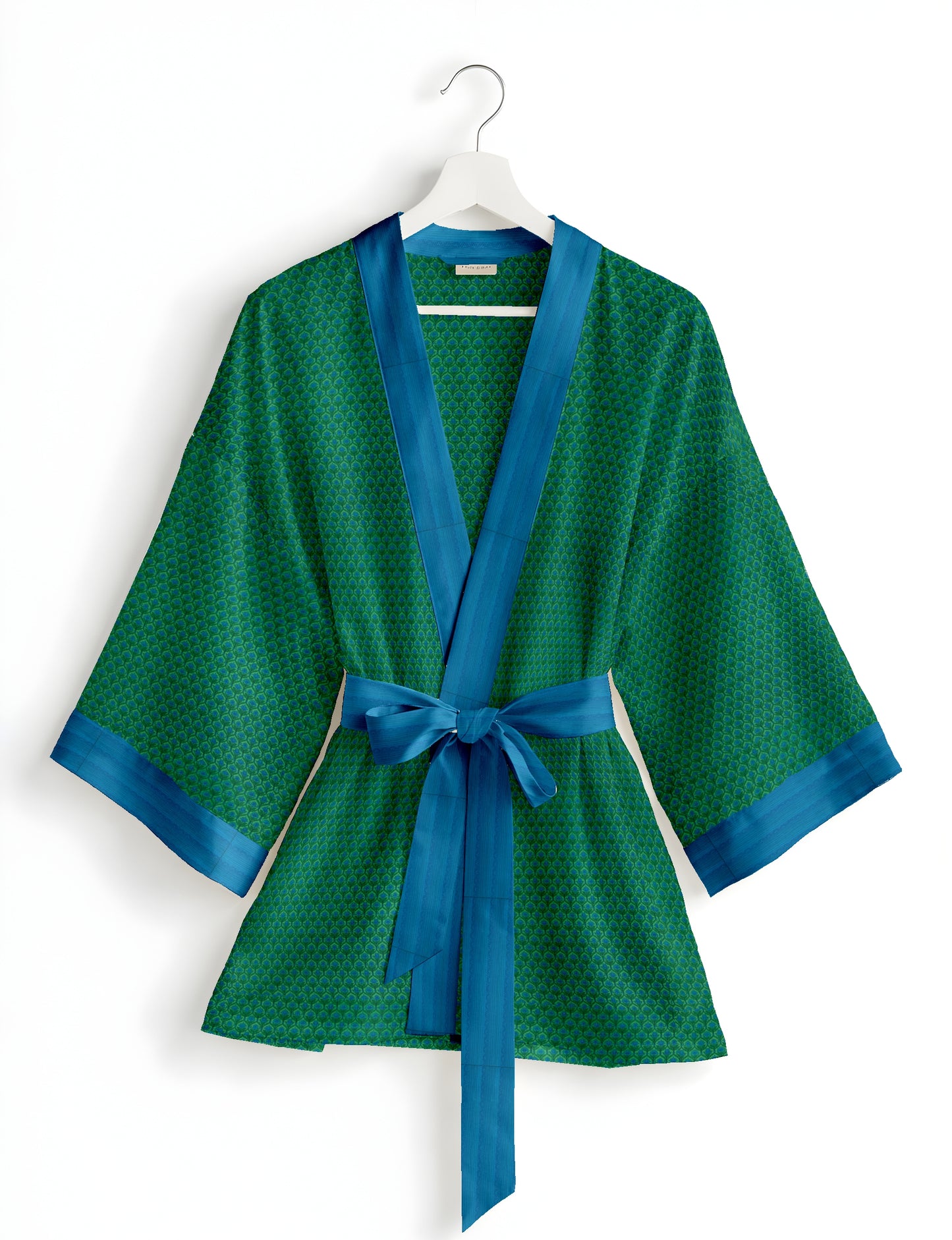 Short kimono robe with wrap front, V-neckline, wide sleeves, waist tie, and concealed skort detail.