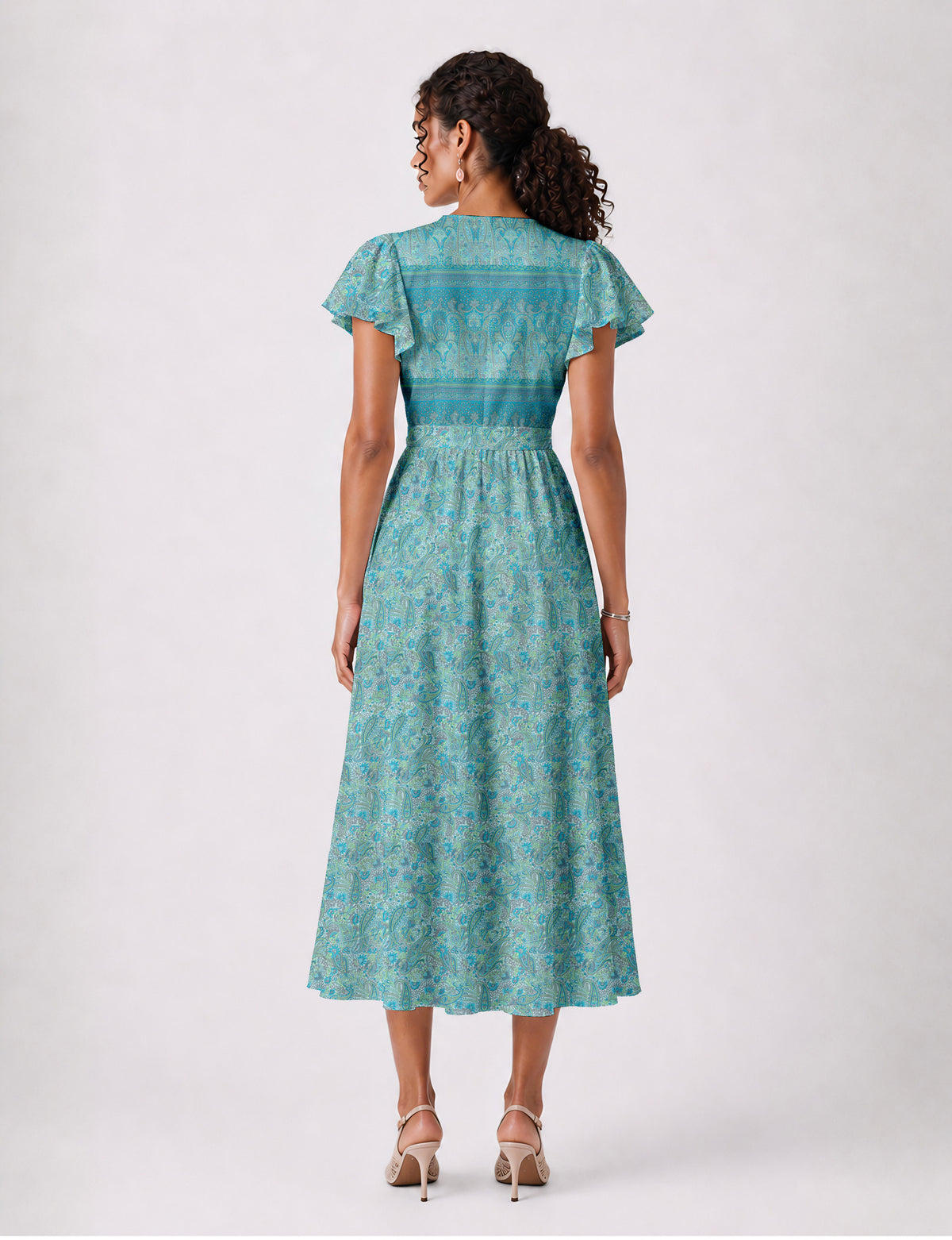 Elegant midi wrap dress with a V-neckline, adjustable waist tie, fitted bodice, and flared skirt for a timeless, flattering silhouette.