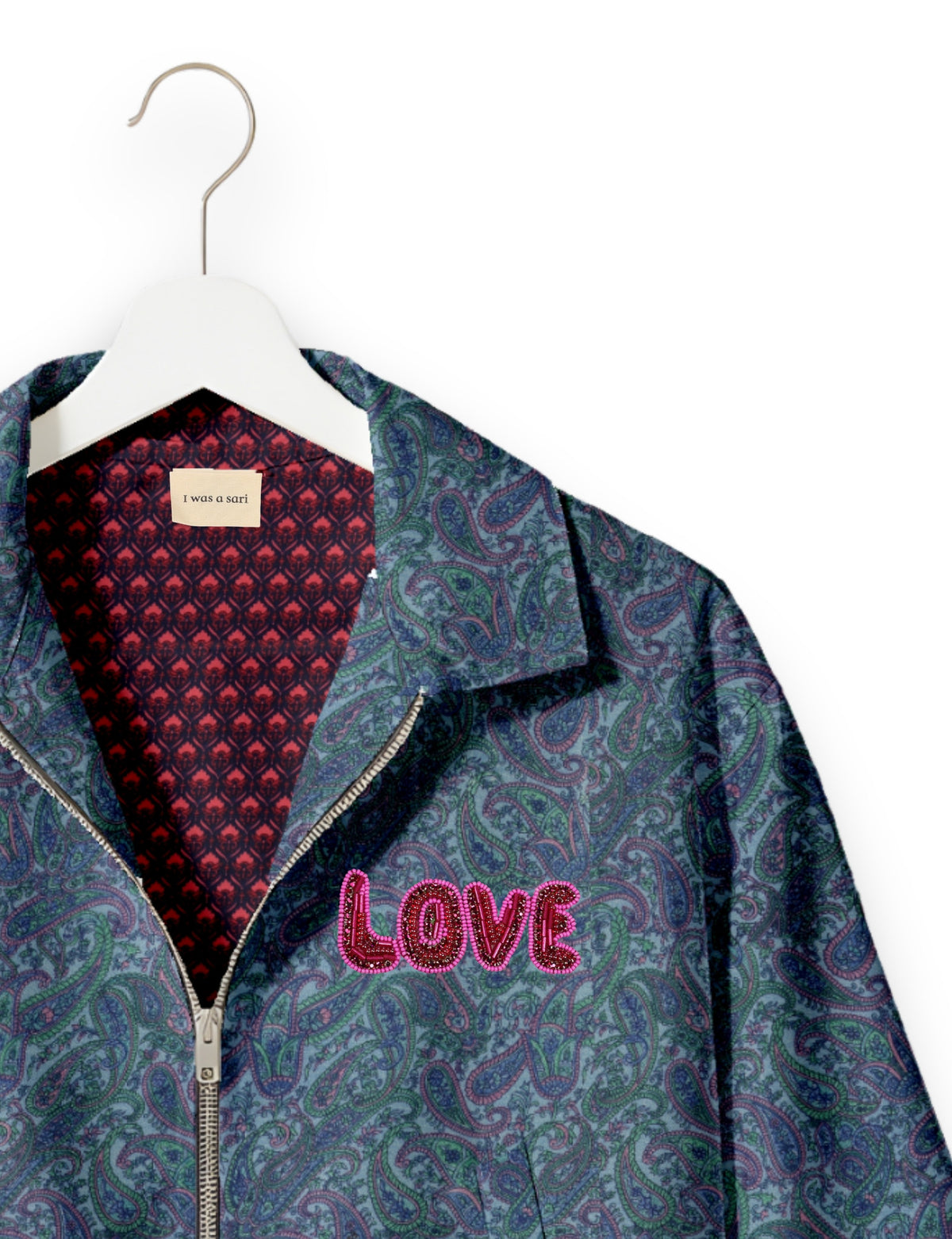 Love Bomber Jacket made from recycled fabric, featuring hand-stitched Aari embroidery. A unique piece of zero-waste clothing, part of the circular fashion movement. Designed with upcycled materials for a stylish yet environmentally friendly clothing choice.