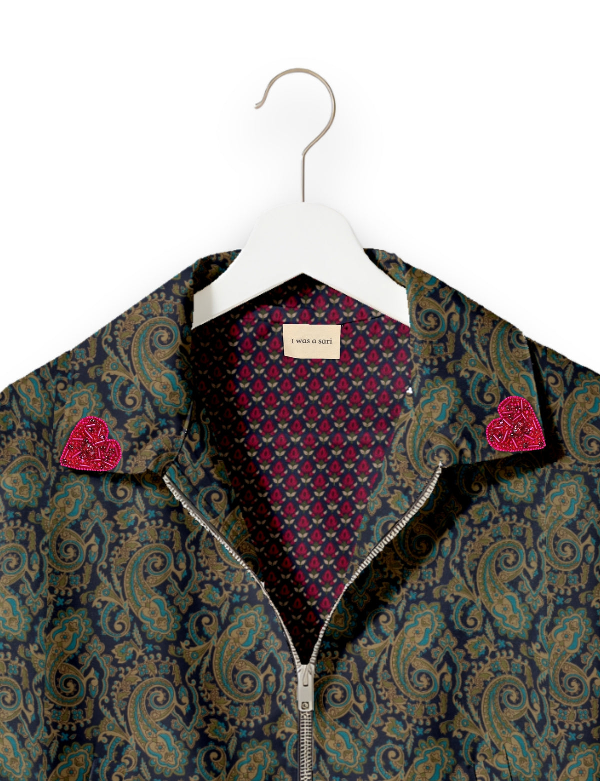 Love Bomber Jacket made from recycled fabric, featuring hand-stitched Aari embroidery. A unique piece of zero-waste clothing, part of the circular fashion movement. Designed with upcycled materials for a stylish yet environmentally friendly clothing choice.