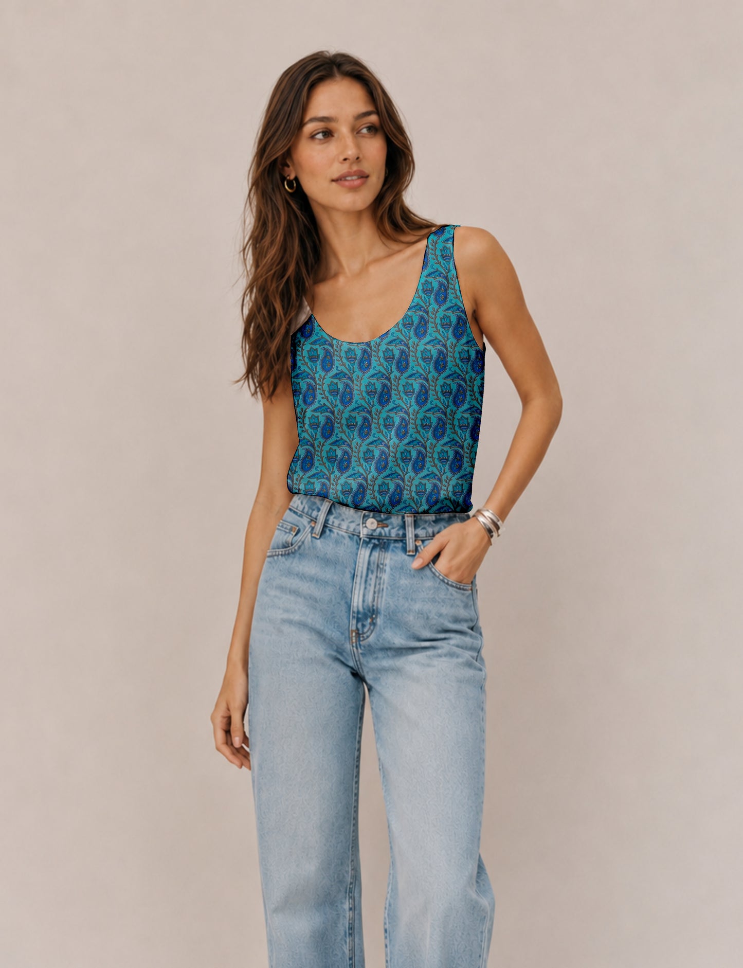 Women's sleeveless blouse with a relaxed straight fit, wide scoop neckline, deep scoop back, and hip-length silhouette.