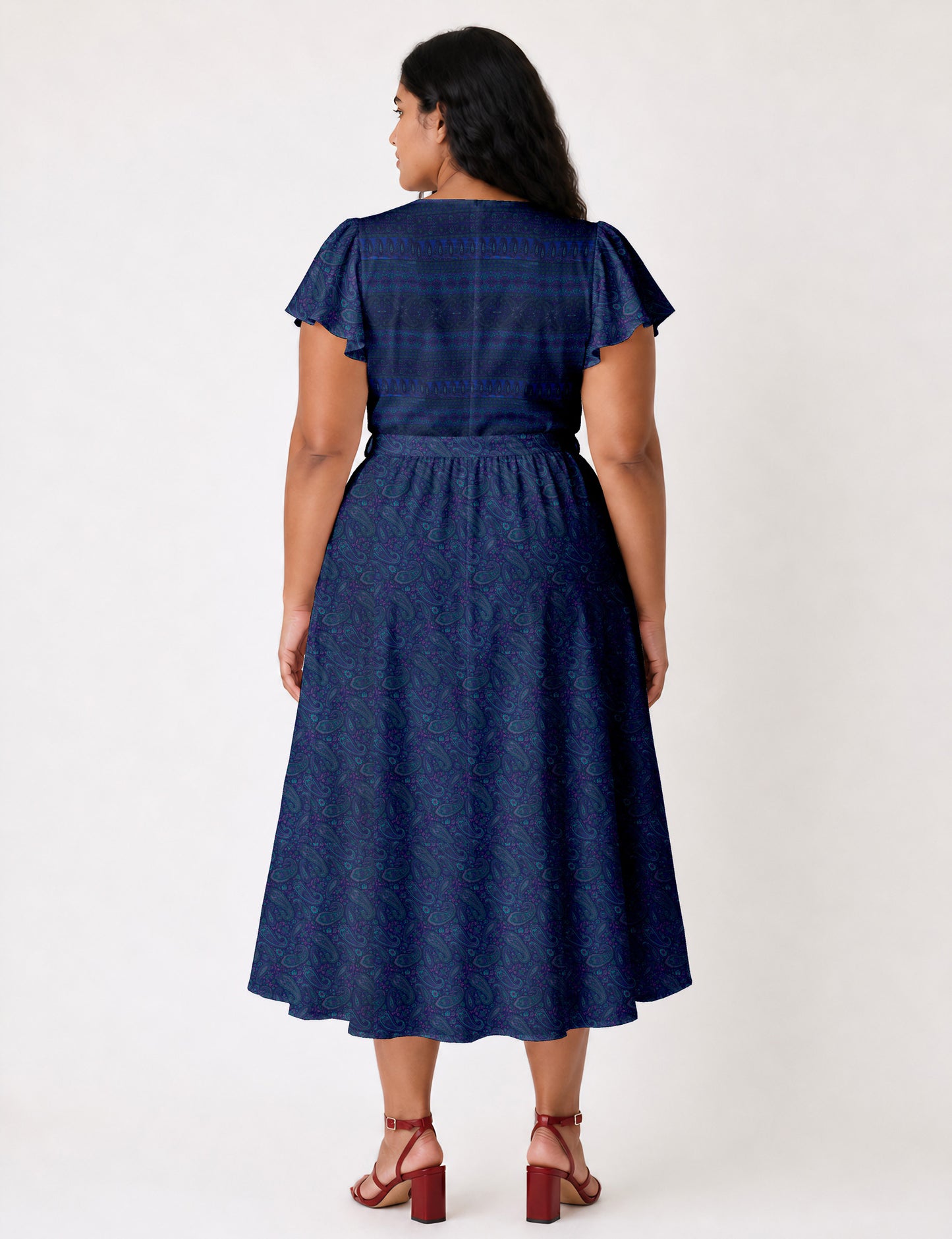 Elegant midi wrap dress with a V-neckline, adjustable waist tie, fitted bodice, and flared skirt for a timeless, flattering silhouette.