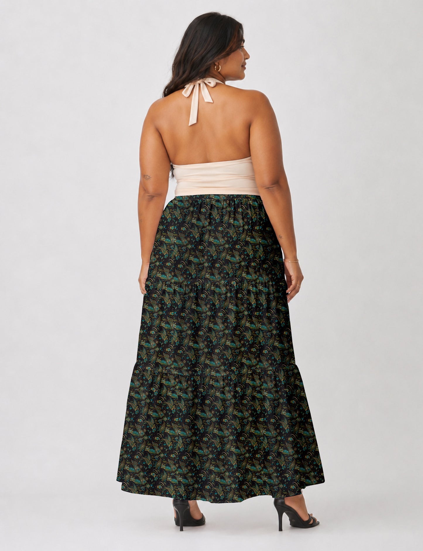 Yellow midi tiered skirt with small dark geometric micro pattern, flat lay front view