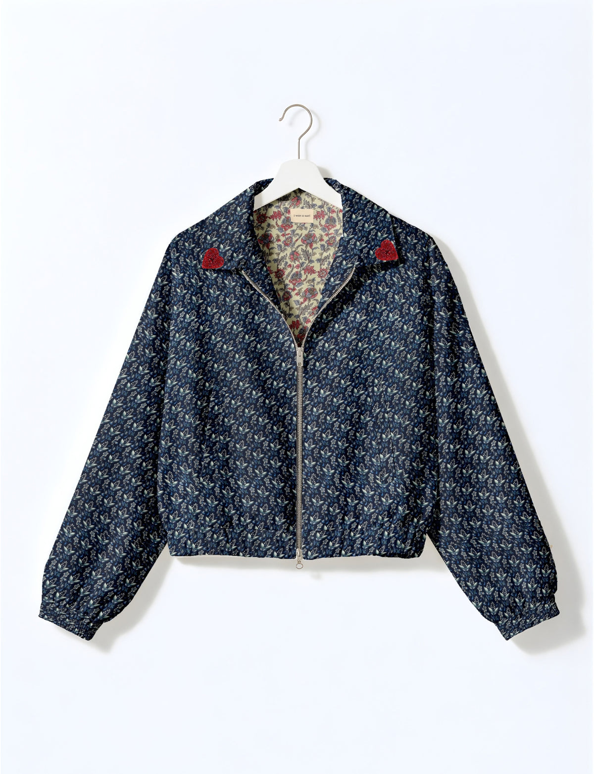 Love Bomber Jacket made from recycled fabric, featuring hand-stitched Aari embroidery. A unique piece of zero-waste clothing, part of the circular fashion movement. Designed with upcycled materials for a stylish yet environmentally friendly clothing choice.
