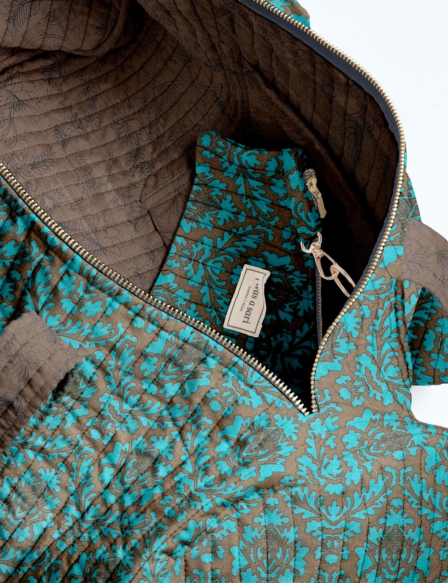 Brown paisley quilted bowling bag with dual handles, front zipper pocket, and "I was a sari" label on front side