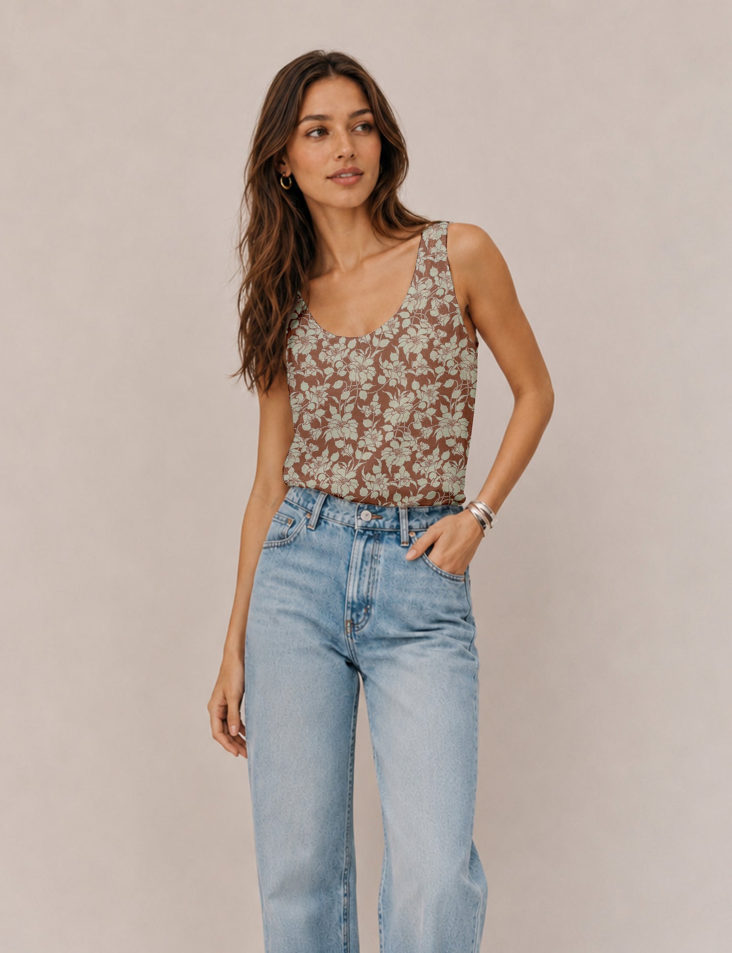 Women's sleeveless blouse with a relaxed straight fit, wide scoop neckline, deep scoop back, and hip-length silhouette.