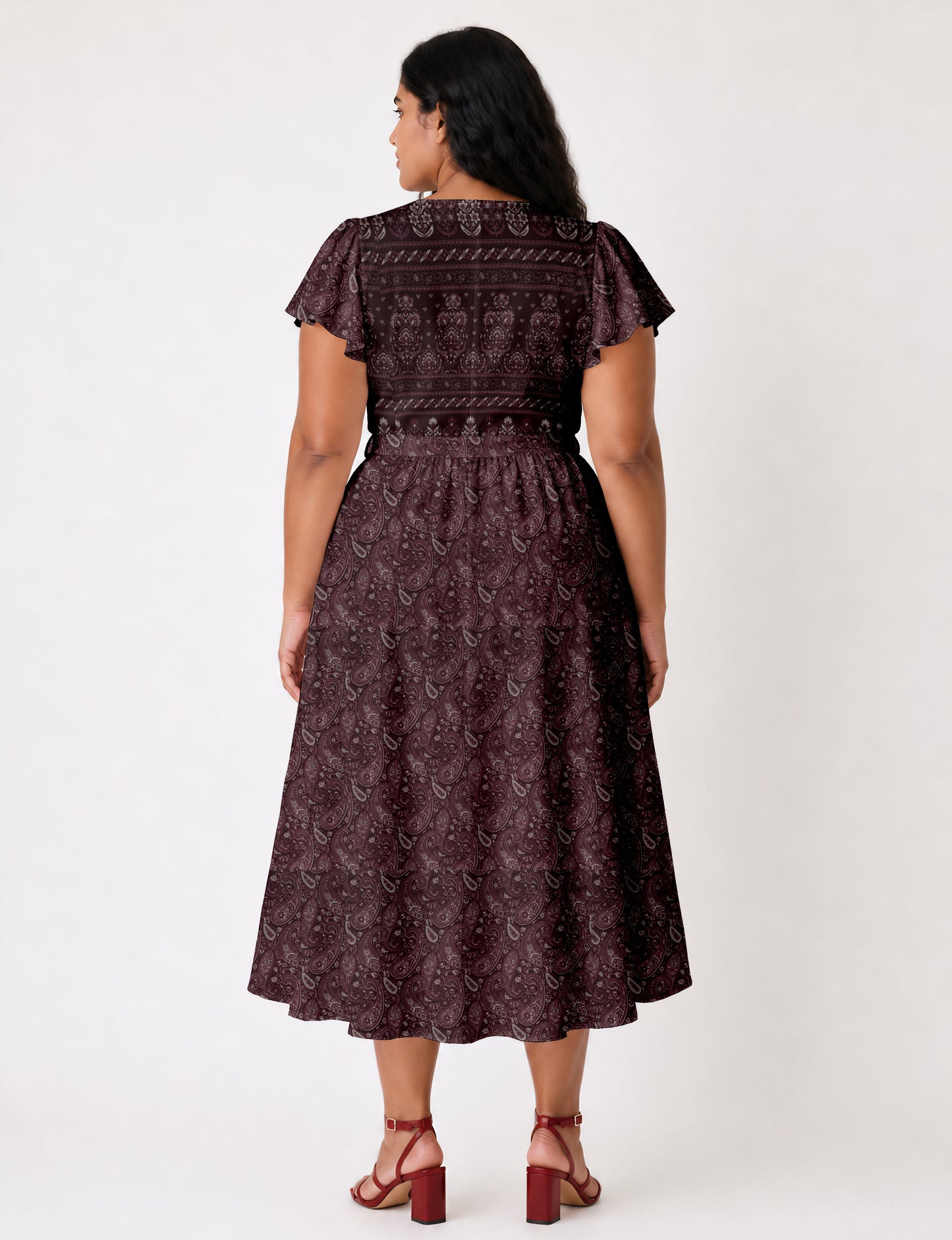 Midi wrap dress with V-neckline, fitted bodice, tie waist, and flared mid-calf skirt