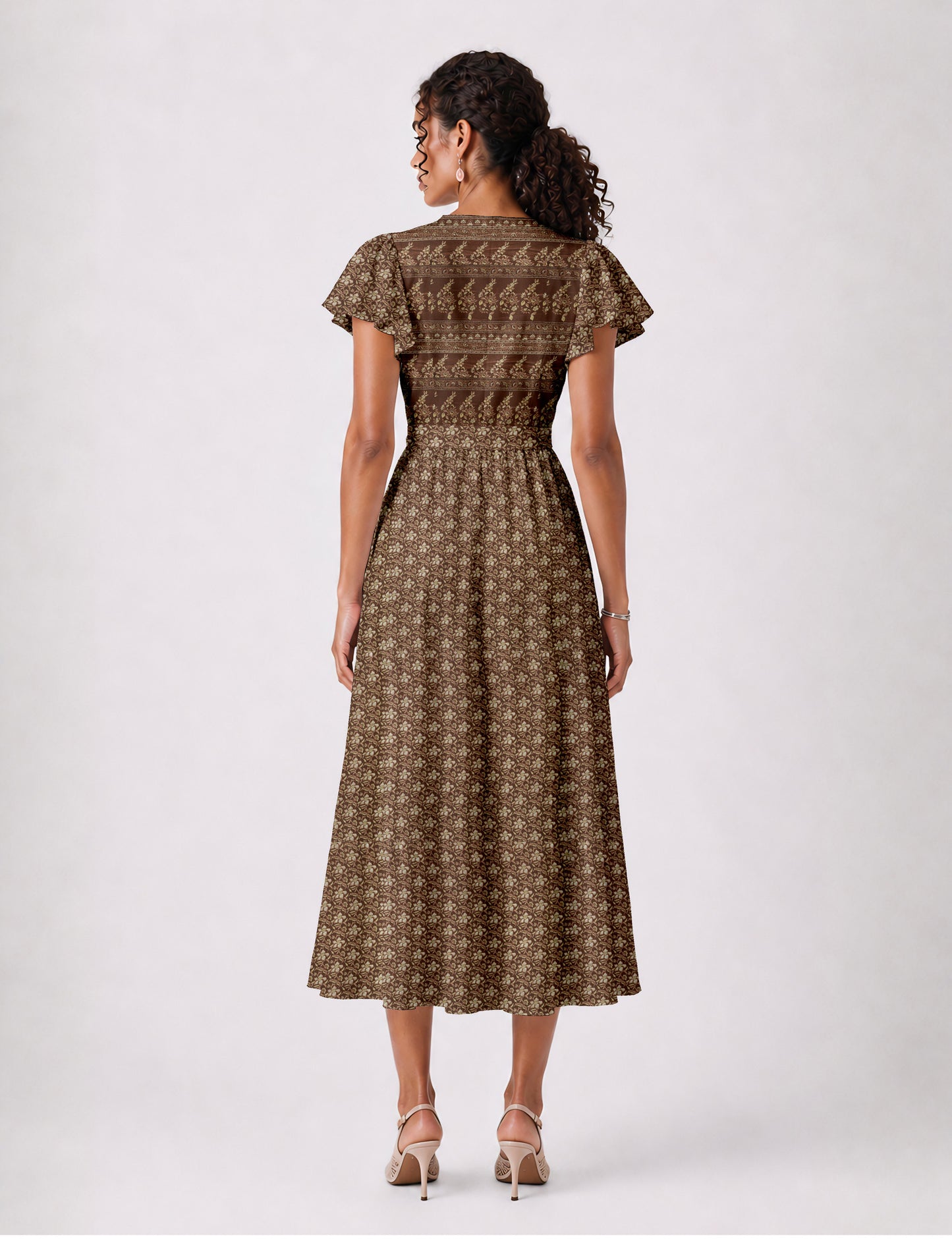 Elegant midi wrap dress with a V-neckline, adjustable waist tie, fitted bodice, and flared skirt for a timeless, flattering silhouette.