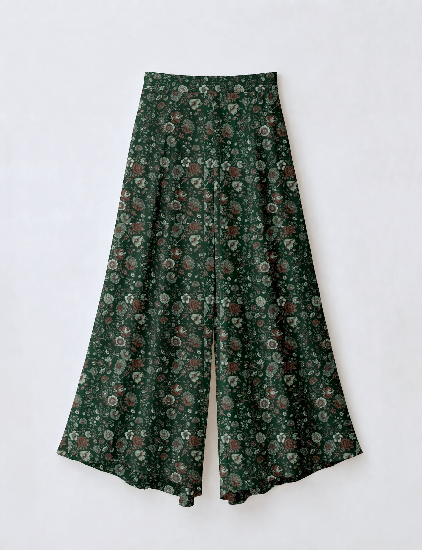 Women's wide leg palazzo trousers with a fitted waistband and relaxed flowing silhouette.