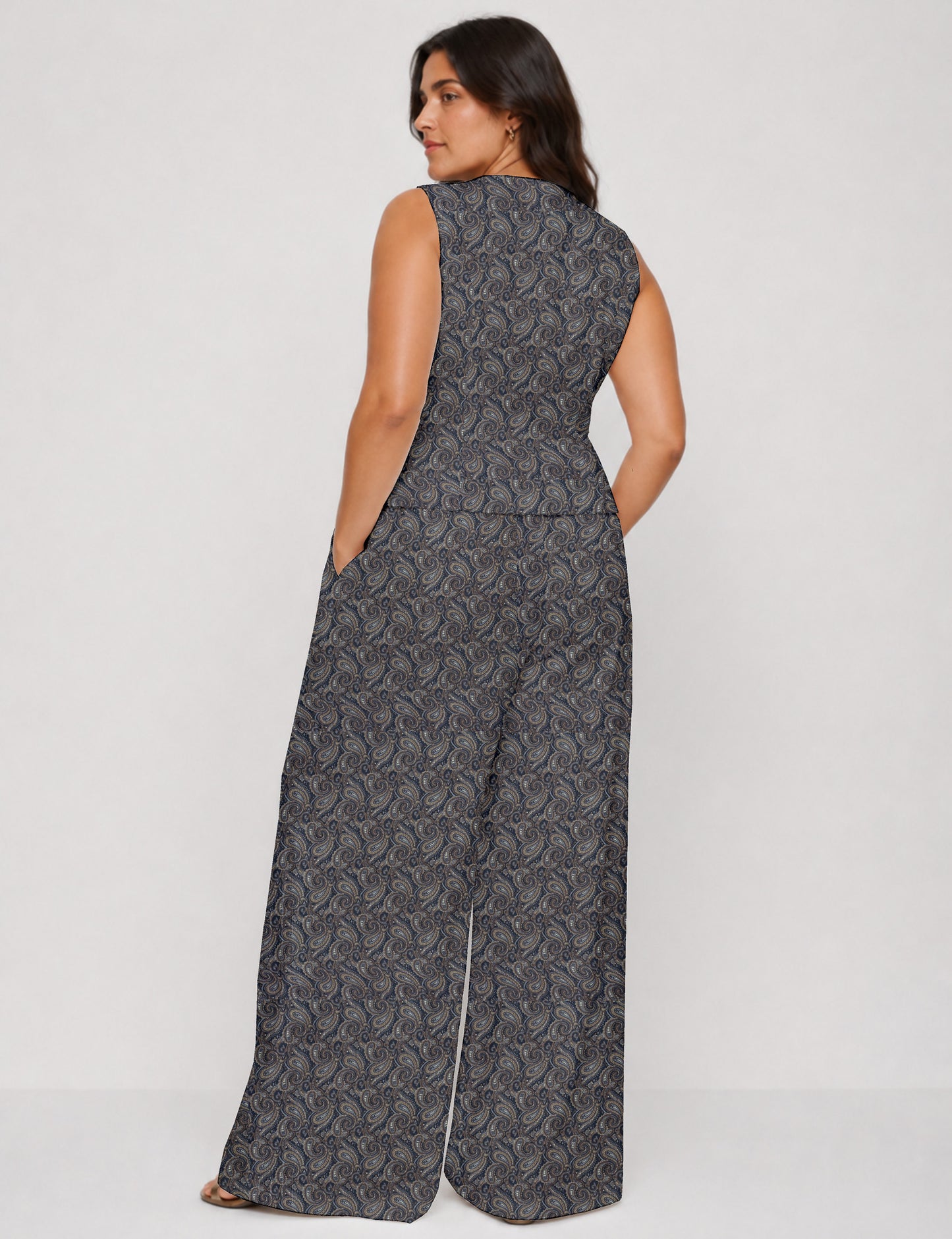 Women's tailored waistcoat set with a sleeveless V-neck button-front waistcoat and high-rise wide leg trousers in a coordinated matching outfit.
