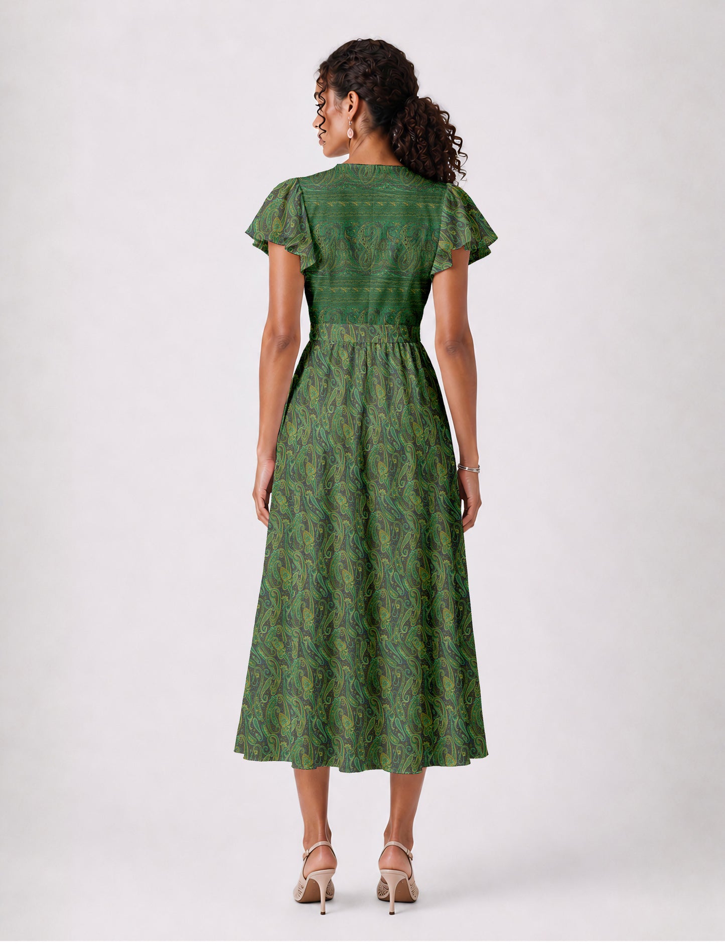 Elegant midi wrap dress with a V-neckline, adjustable waist tie, fitted bodice, and flared skirt for a timeless, flattering silhouette.