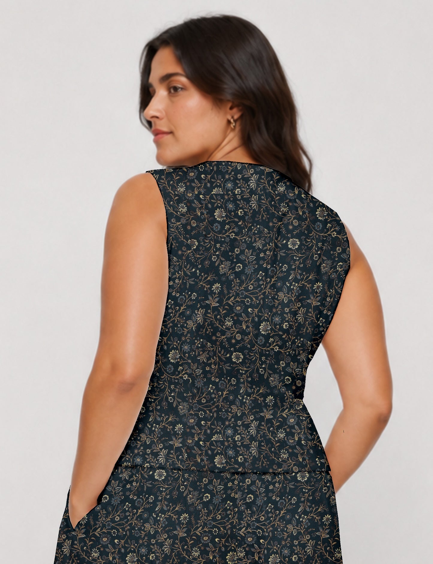 Women's fitted waistcoat with V-neck, single-breasted button closure, tailored silhouette, and pointed hem in sustainable fashion.