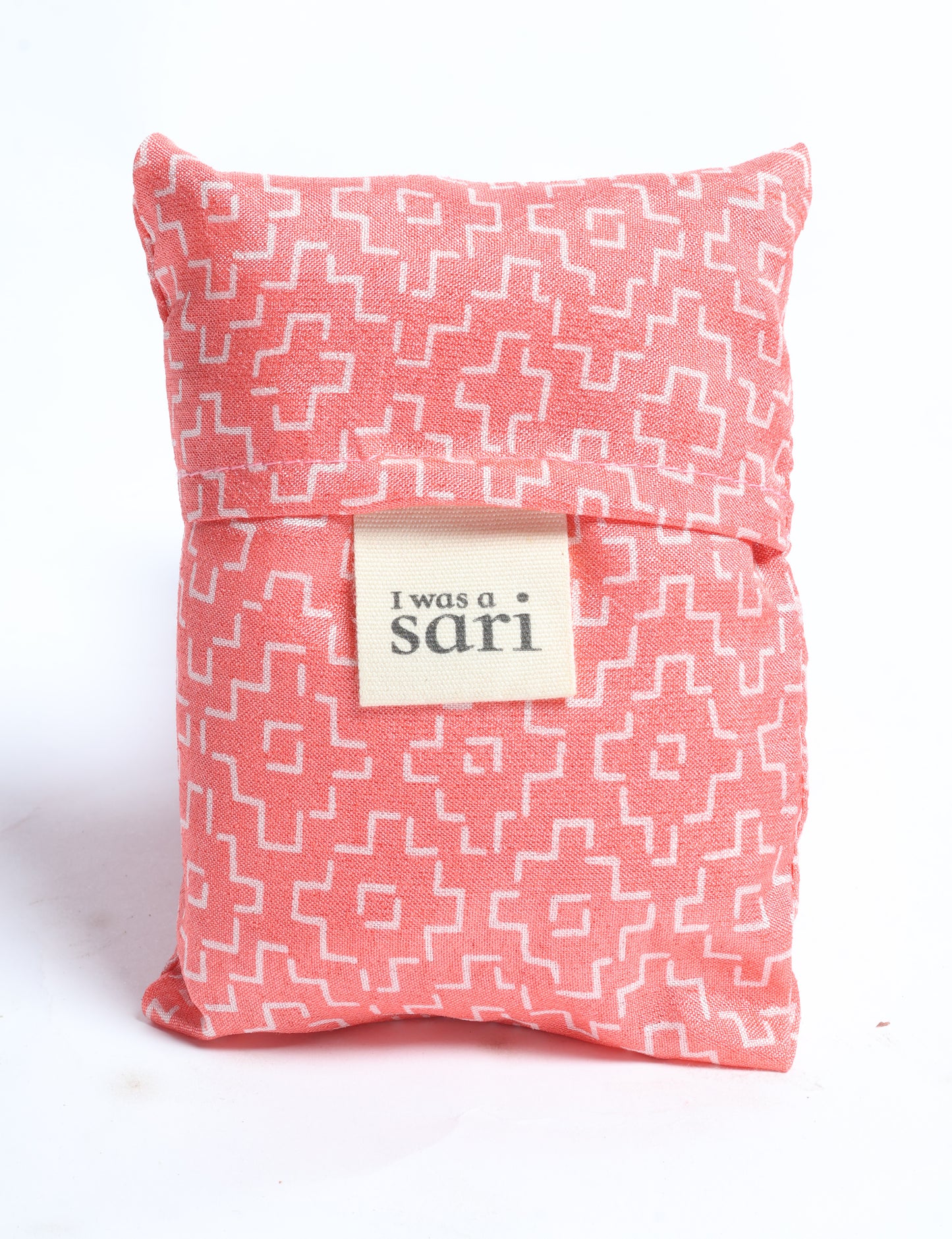 Stay eco-conscious with our Reusable Bag, handmade by Indian artisans from pre-loved saris. Silky and lightweight, this foldaway bag is perfect for your on-the-go lifestyle. Each piece is a unique statement of ethical fashion, embracing sustainability and style.