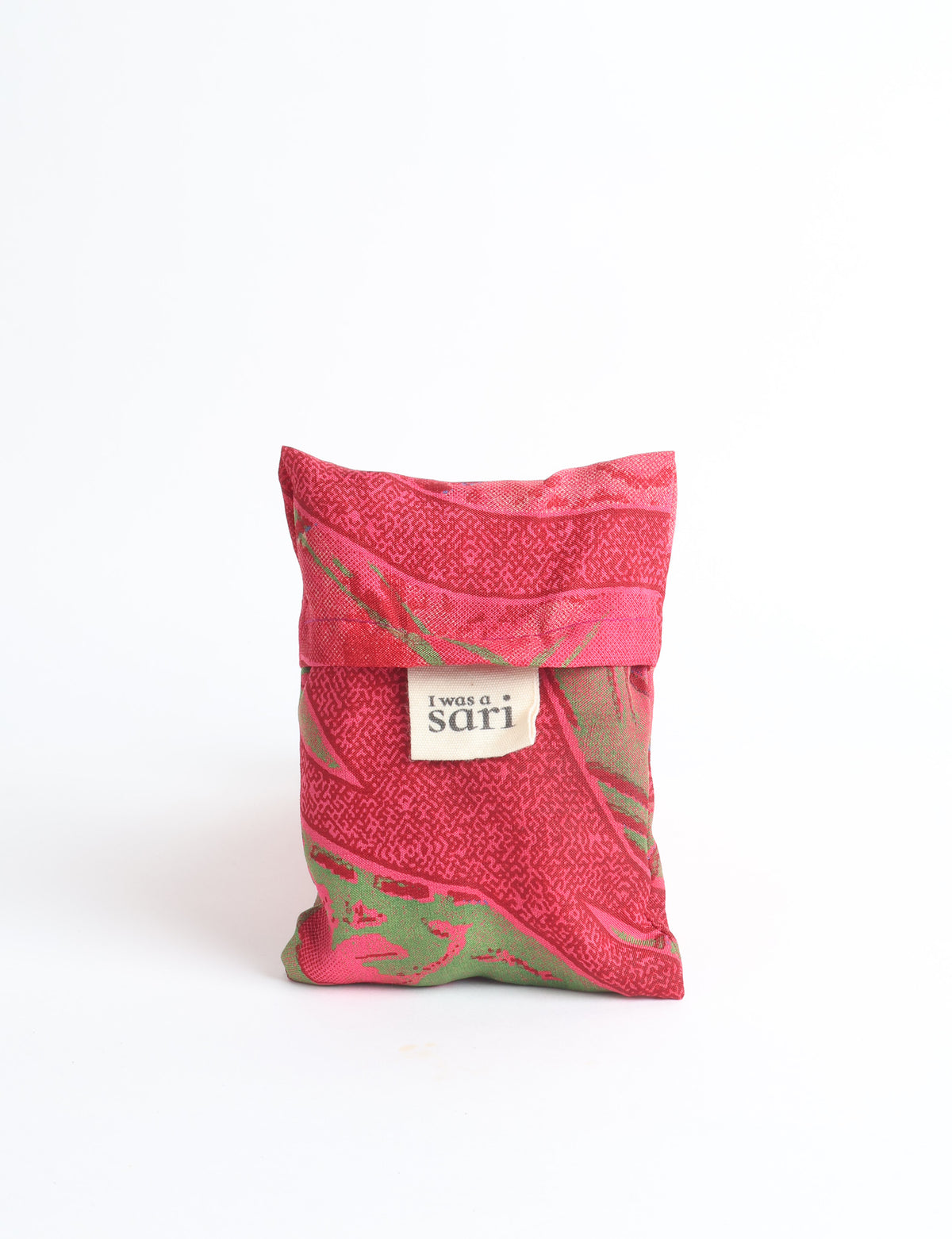 Blue reusable bag with multicolor tropical floral pattern folded with "I was a sari" label visible on front