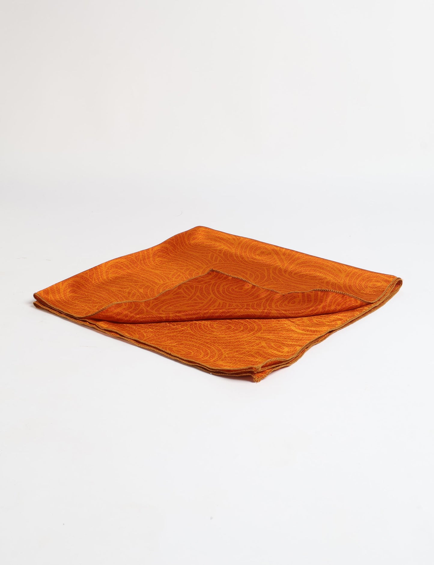 A delicately handcrafted wrap made from recycled sari offcuts, blending sustainable fashion with conscious design. This eco-friendly product showcases the beauty of upcycling and green fashion, making it a perfect accessory for those supporting circular fashion and products made from textile waste.