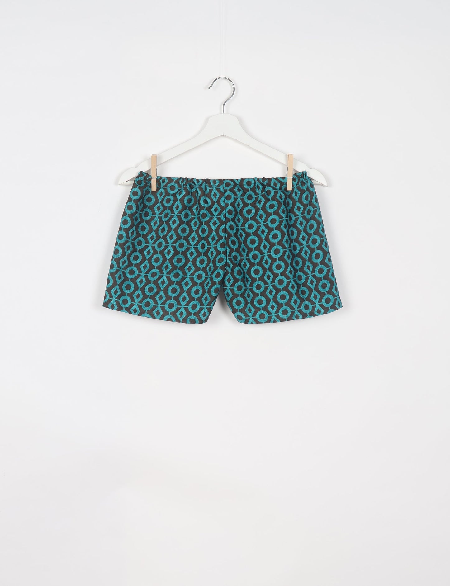 Elevate your wardrobe with our eco-friendly shorts. The all-around elastic waist and drawstring tie provide comfort and style. Crafted with ethical and sustainable practices, these shorts redefine green fashion, making them a perfect addition to your conscious clothing collection.