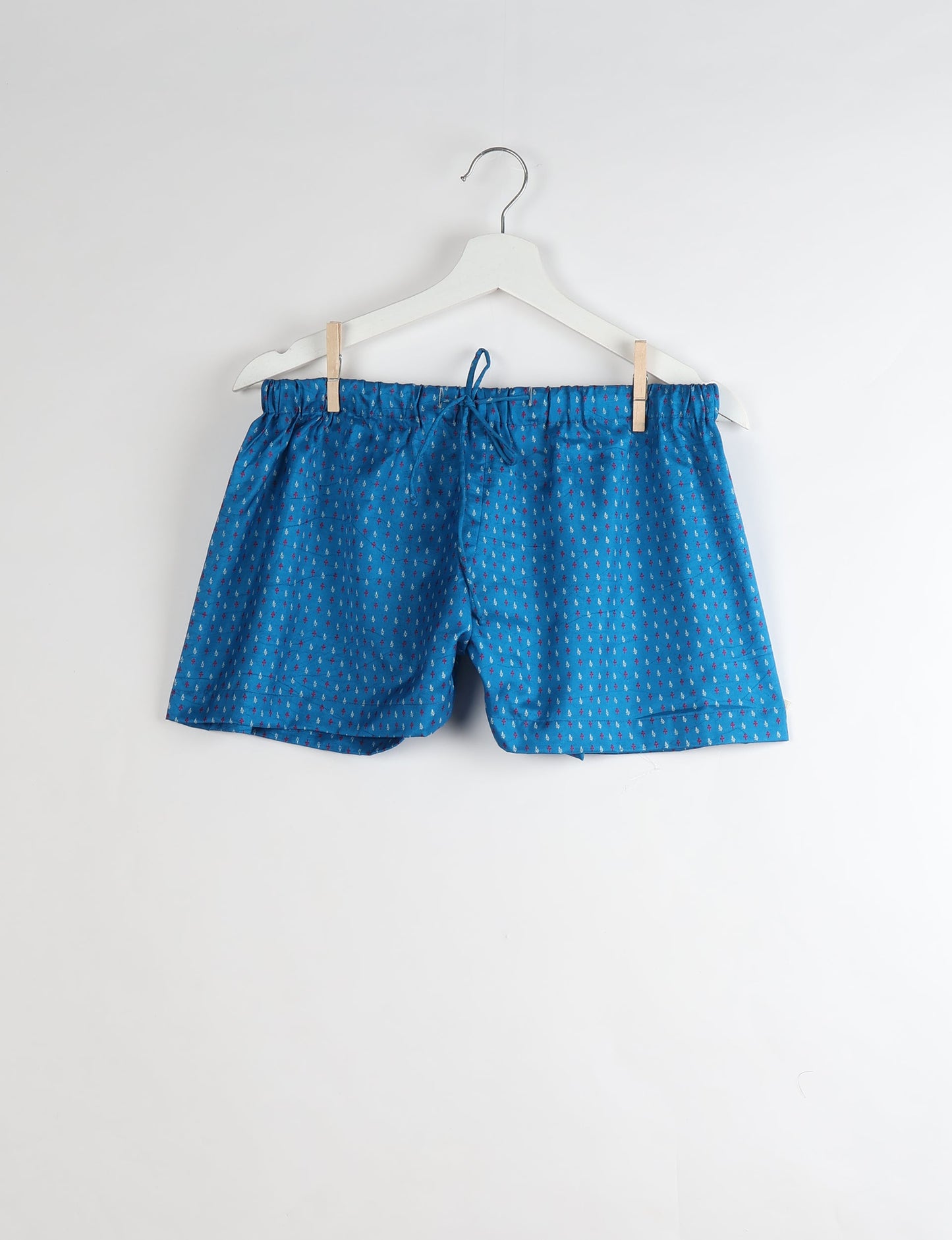 Sleep in eco-friendly luxury with our PJ Set Short. Made for the conscious consumer, these pajamas contribute to zero waste and sustainable practices. The cami top, adorned with delicate eyelash lace and cut on the bias, pairs seamlessly with the comfy shorts featuring an elasticated waist and drawstring tie.