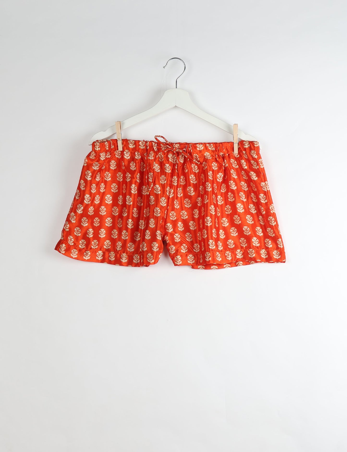 Sleep in eco-friendly luxury with our PJ Set Short. Made for the conscious consumer, these pajamas contribute to zero waste and sustainable practices. The cami top, adorned with delicate eyelash lace and cut on the bias, pairs seamlessly with the comfy shorts featuring an elasticated waist and drawstring tie.