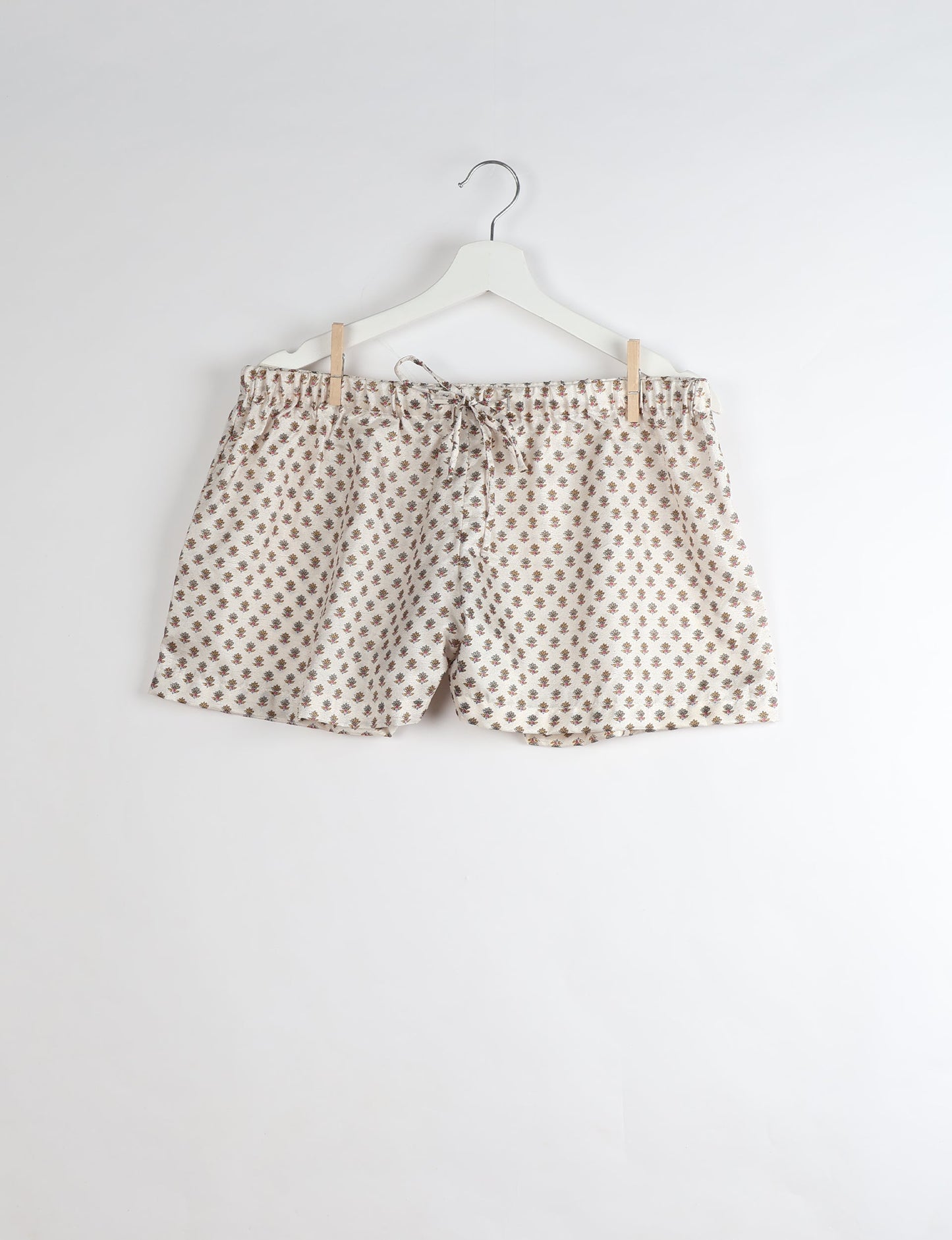 Sleep in eco-friendly luxury with our PJ Set Short. Made for the conscious consumer, these pajamas contribute to zero waste and sustainable practices. The cami top, adorned with delicate eyelash lace and cut on the bias, pairs seamlessly with the comfy shorts featuring an elasticated waist and drawstring tie.