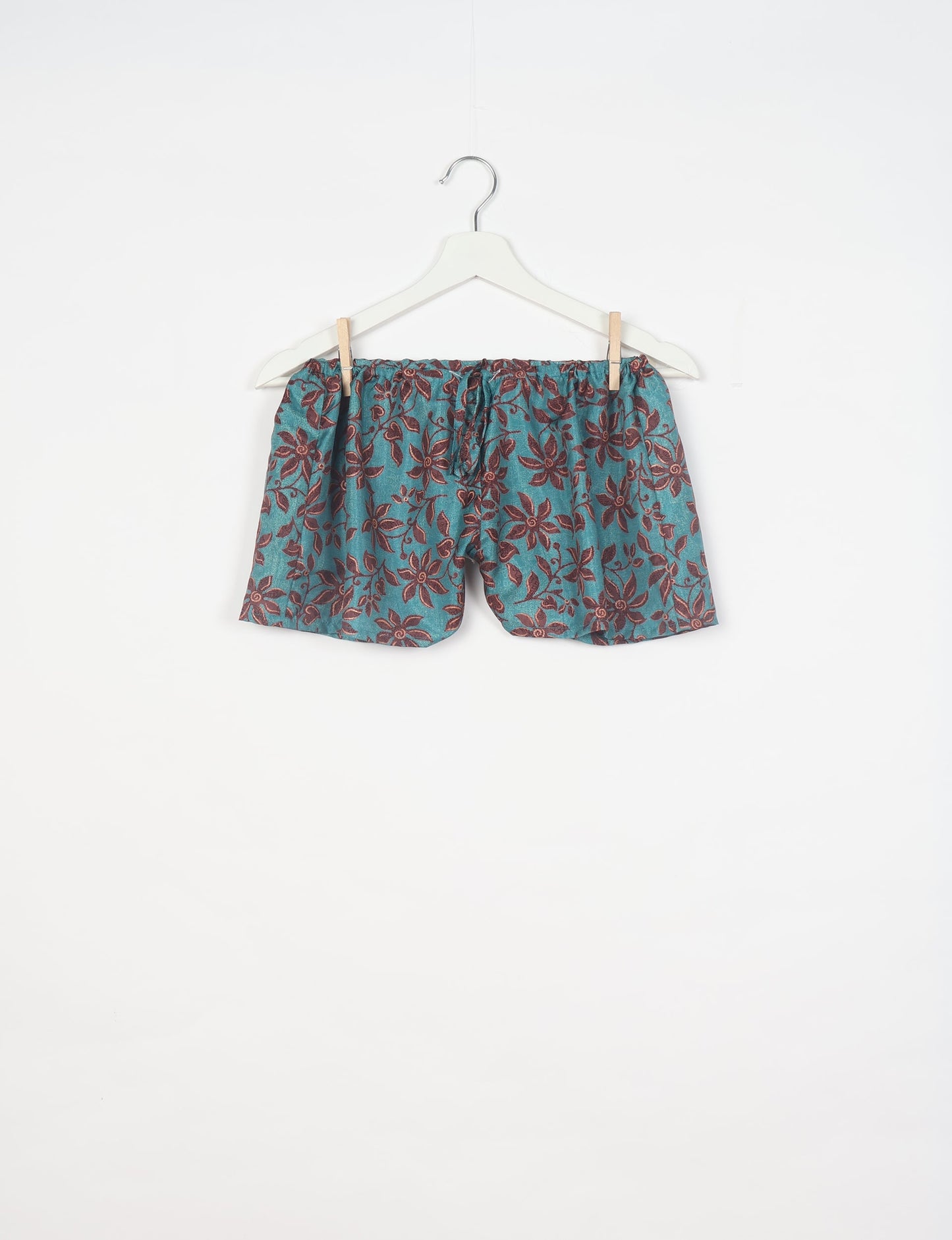 Sleep in eco-friendly luxury with our PJ Set Short. Made for the conscious consumer, these pajamas contribute to zero waste and sustainable practices. The cami top, adorned with delicate eyelash lace and cut on the bias, pairs seamlessly with the comfy shorts featuring an elasticated waist and drawstring tie.