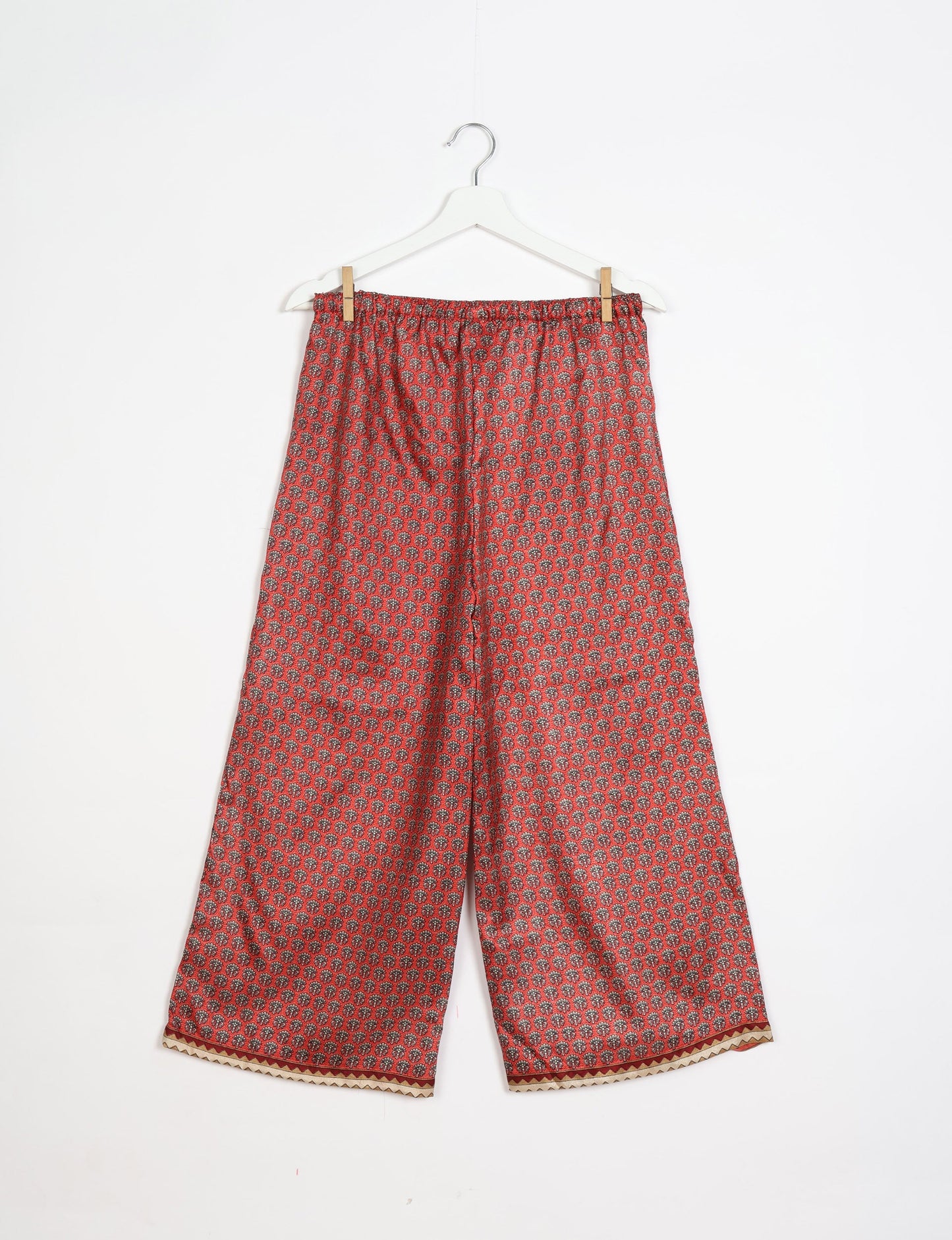 Step into sustainable fashion with our Palazzo Pants – a harmonious blend of Indian and Italian influences. These wide-legged pants, made from upcycled saris, offer comfort with an all-around elastic waist and a stylish flared leg. Make a statement with eco-friendly, chic palazzo pants that redefine ethical clothing.