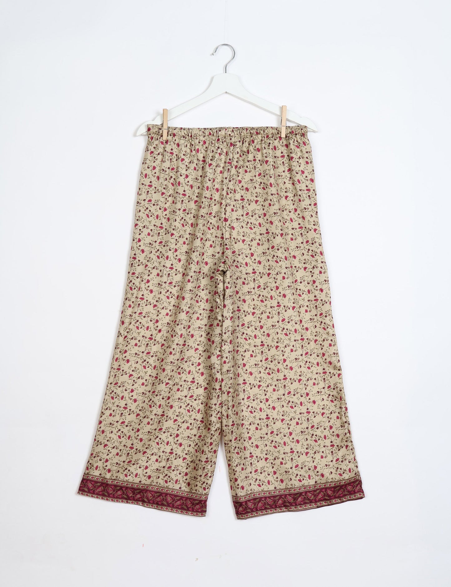 Step into sustainable fashion with our Palazzo Pants – a harmonious blend of Indian and Italian influences. These wide-legged pants, made from upcycled saris, offer comfort with an all-around elastic waist and a stylish flared leg. Make a statement with eco-friendly, chic palazzo pants that redefine ethical clothing.