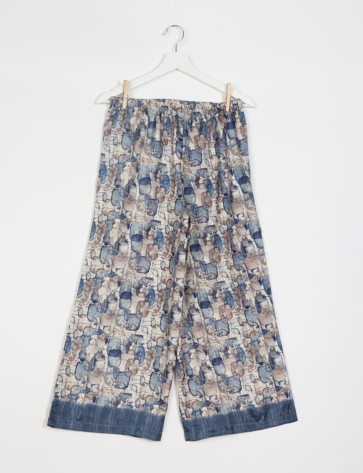 Step into sustainable fashion with our Palazzo Pants – a harmonious blend of Indian and Italian influences. These wide-legged pants, made from upcycled saris, offer comfort with an all-around elastic waist and a stylish flared leg. Make a statement with eco-friendly, chic palazzo pants that redefine ethical clothing.