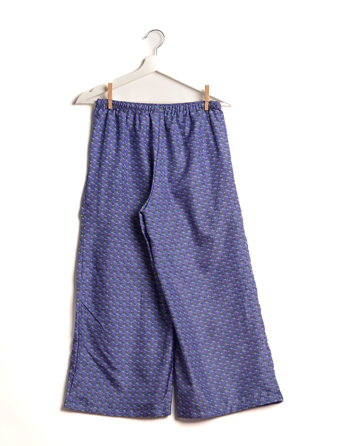 Step into sustainable fashion with our Palazzo Pants – a harmonious blend of Indian and Italian influences. These wide-legged pants, made from upcycled saris, offer comfort with an all-around elastic waist and a stylish flared leg. Make a statement with eco-friendly, chic palazzo pants that redefine ethical clothing.
