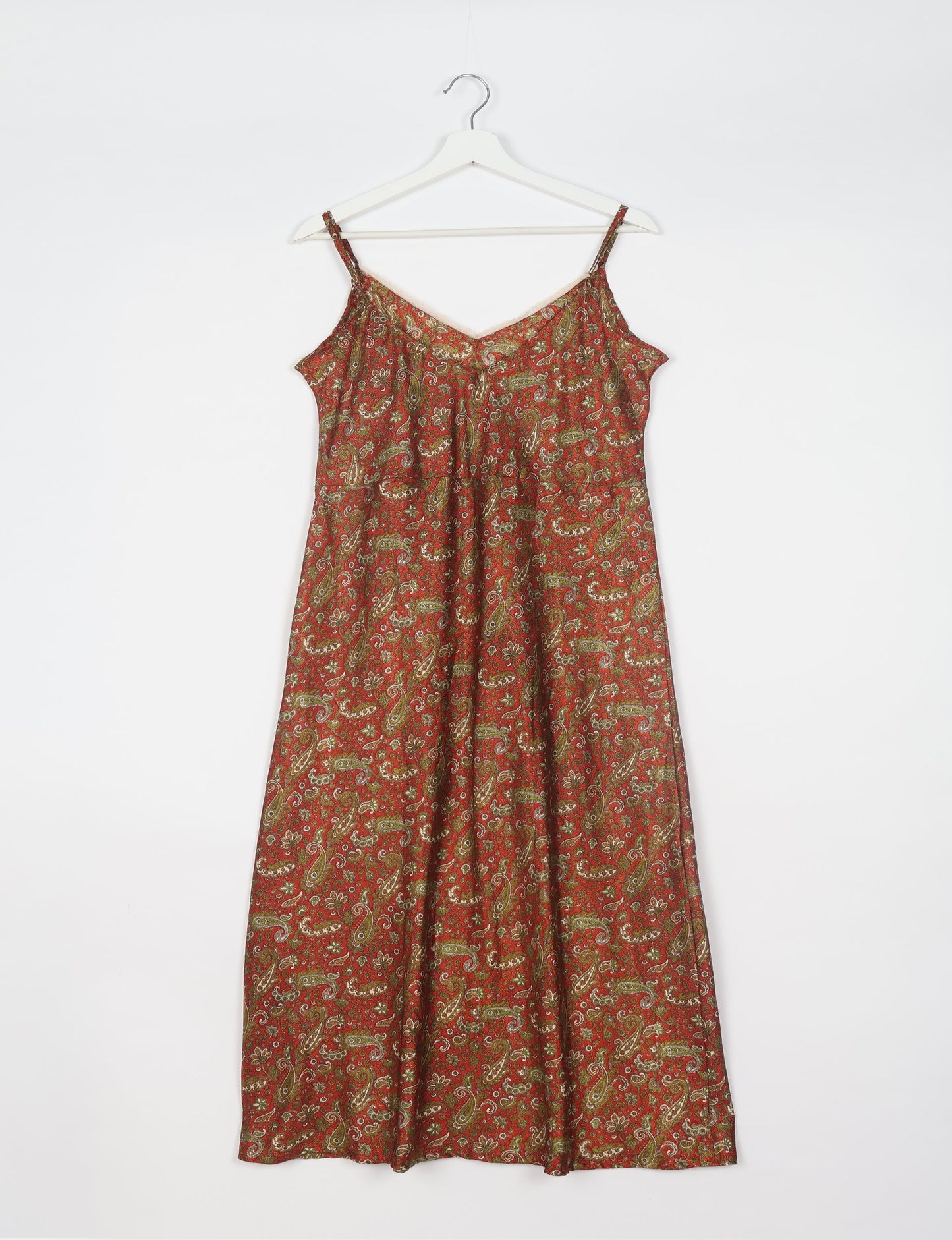 Spaghetti strap dress made from sustainable materials, embodying ethical fashion principles. Ideal for eco-friendly travelers seeking laid-back style.