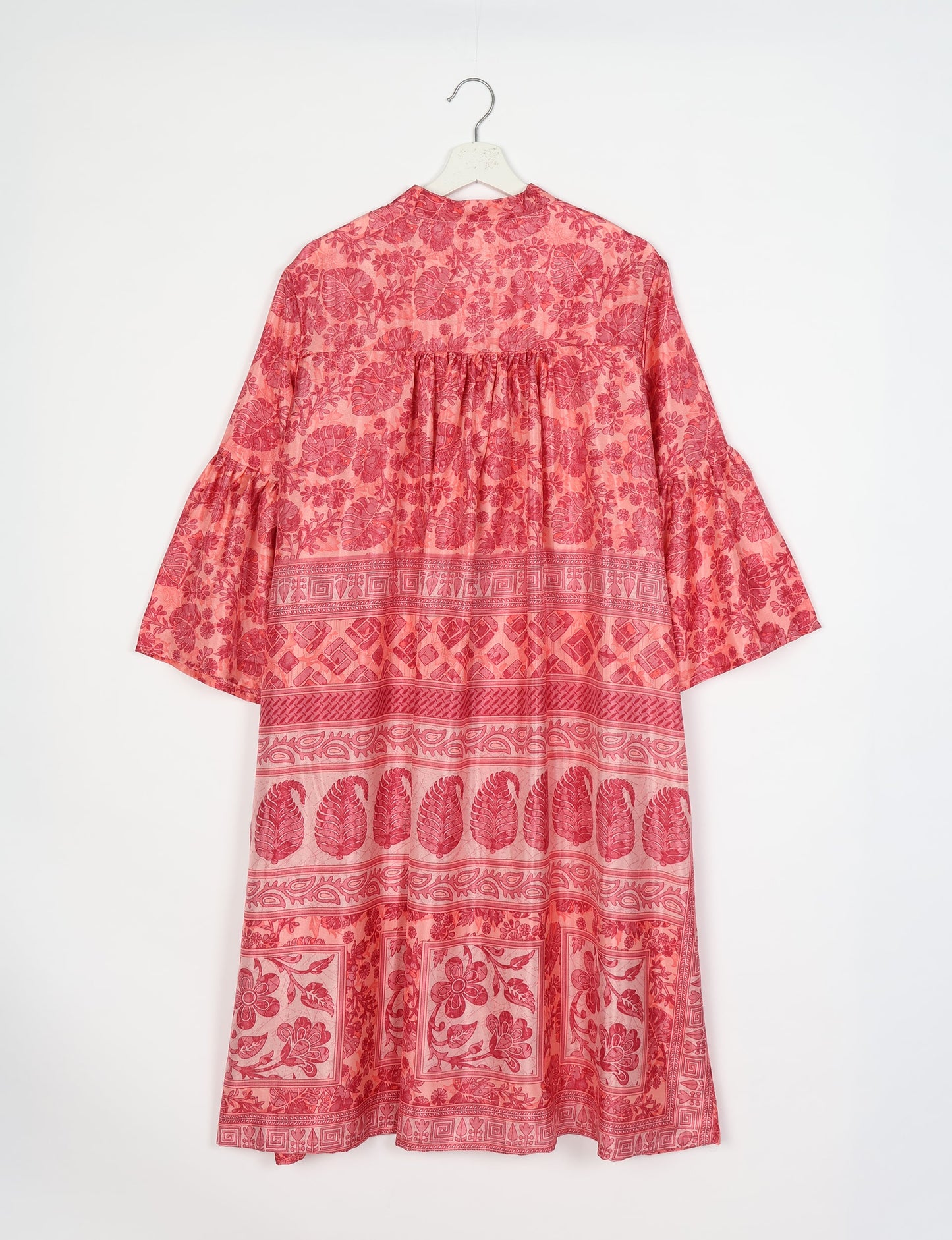 Discover ethical elegance with our Bell Sleeve Coat, handcrafted by Indian artisans from recycled materials. This sustainable fashion piece is a statement in eco-friendly clothing, combining style and consciousness effortlessly.