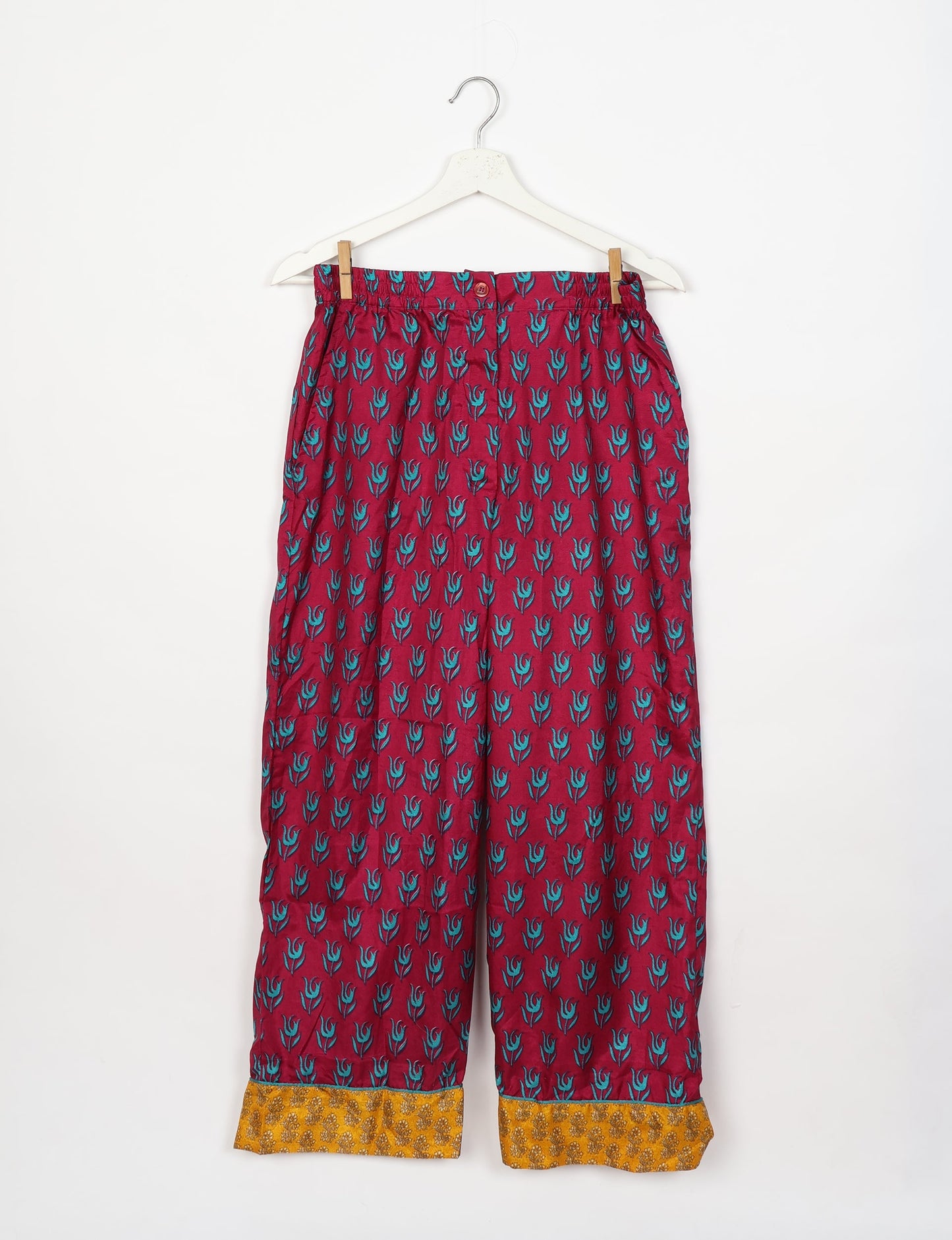 Chic long-sleeve pajama set made from recycled materials, representing eco friendly products, repurposed clothing, and zero waste clothing in green fashion.