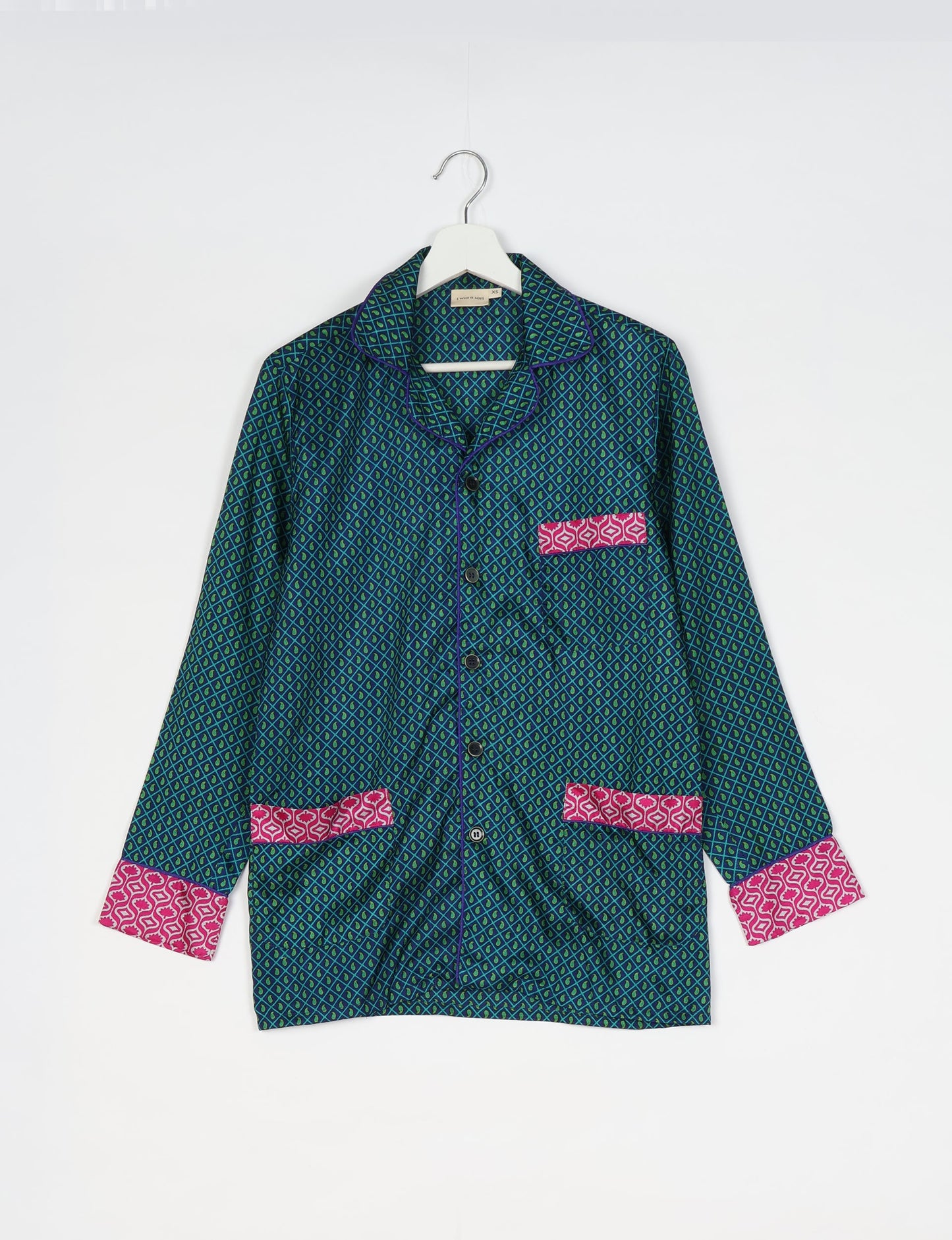 Chic long-sleeve pajama set made from recycled materials, representing eco friendly products, repurposed clothing, and zero waste clothing in green fashion.