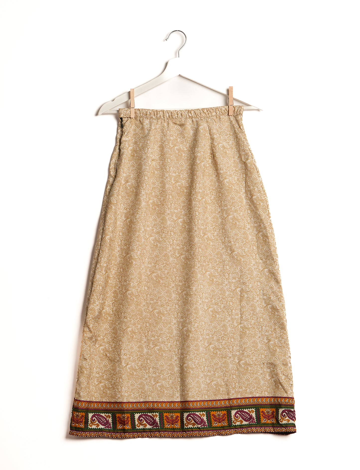 Sustainable A LINE SKIRT, a high-fashion choice for conscious individuals. Fitted at the waist, ankle-length, and ethically crafted for eco-friendly style.