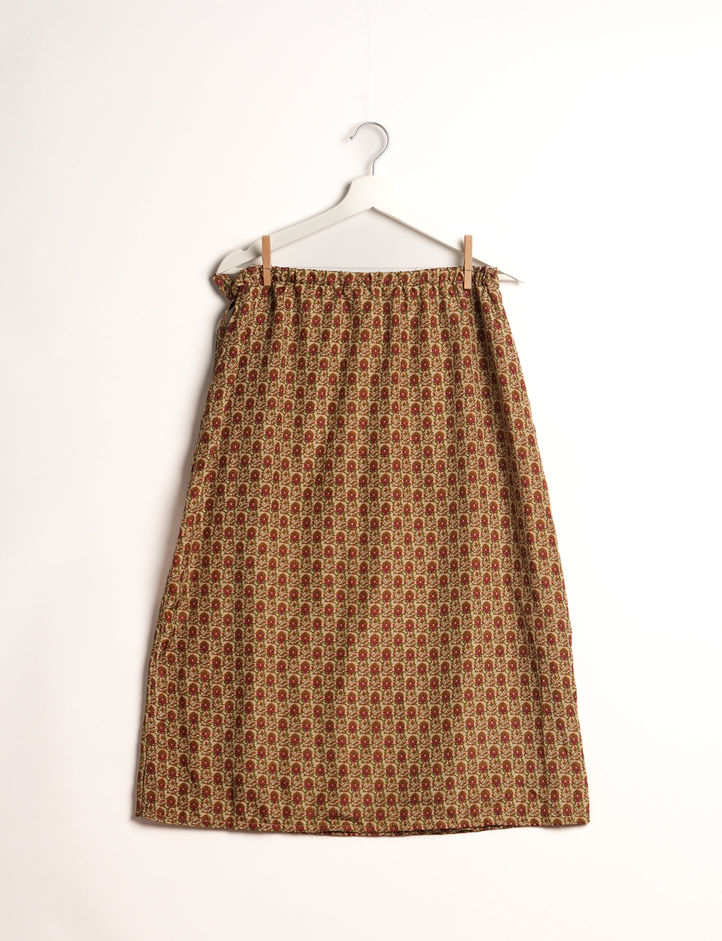 Versatile and sustainable LONG WRAPAROUND SKIRT, mid-calf length, defying convention and suitable for all waist sizes. Elevate your style with this eco-friendly and comfortable piece, creating a unique and inclusive fashion experience.