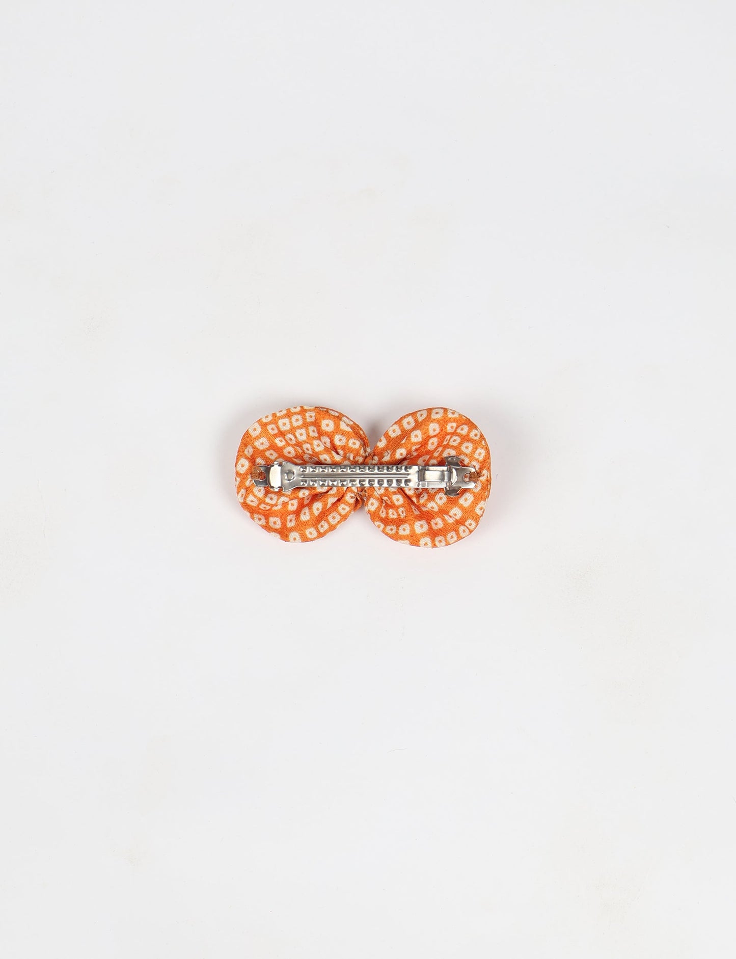 Stylish upcycled women's hairclip made from eco friendly products, reflecting the essence of upcycling fashion, ethical clothing, and sustainable apparel—ideal for those embracing slow fashion and earth friendly clothing.