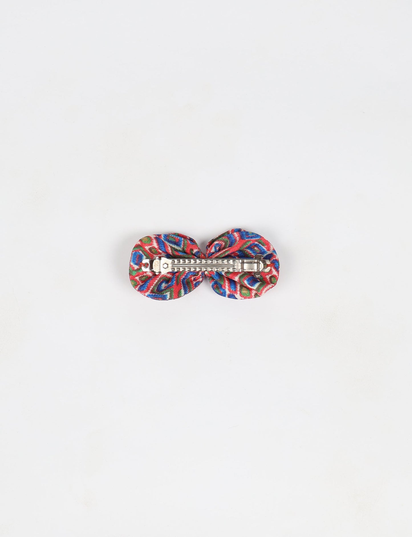 Stylish upcycled women's hairclip made from eco friendly products, reflecting the essence of upcycling fashion, ethical clothing, and sustainable apparel—ideal for those embracing slow fashion and earth friendly clothing.