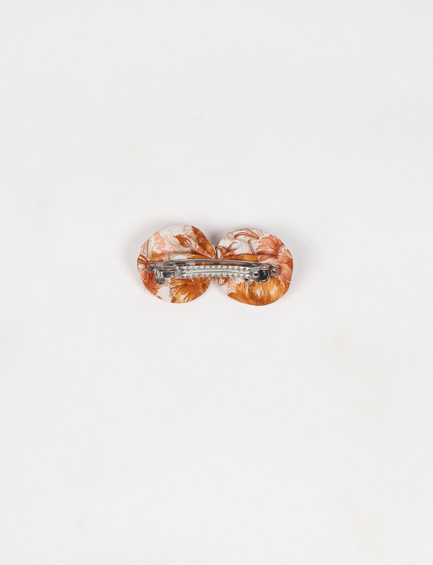 Stylish upcycled women's hairclip made from eco friendly products, reflecting the essence of upcycling fashion, ethical clothing, and sustainable apparel—ideal for those embracing slow fashion and earth friendly clothing.