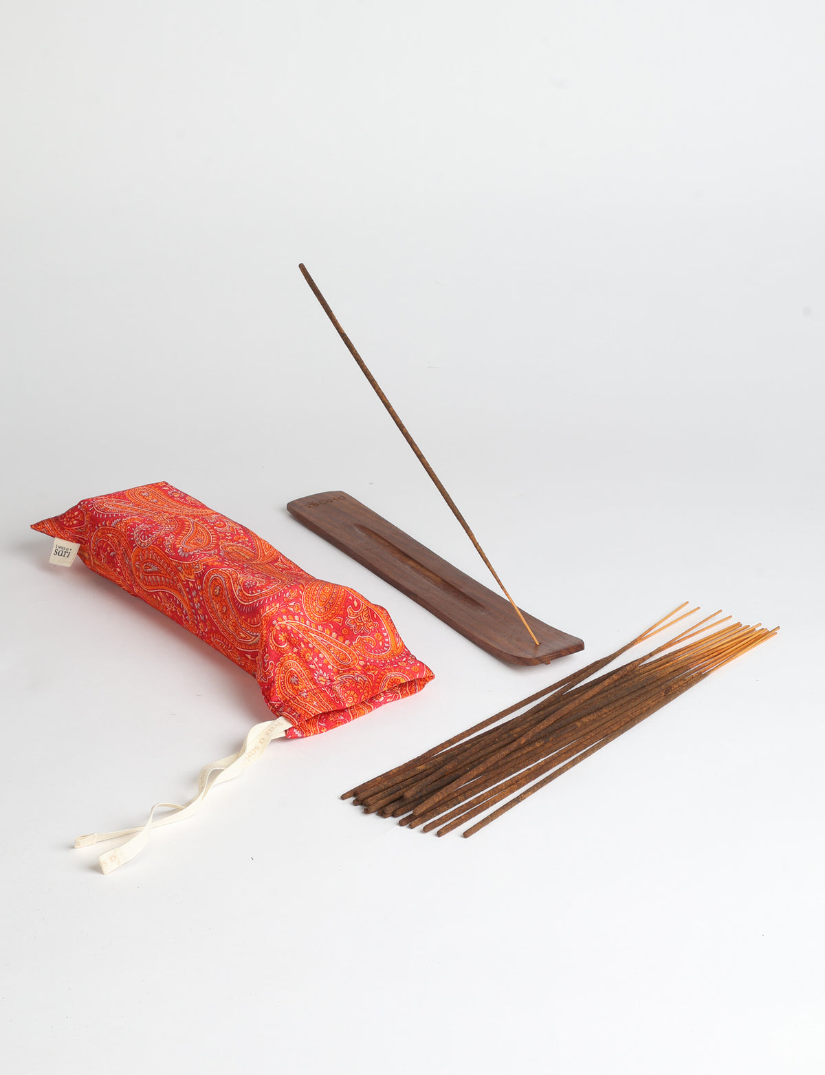 Incense stick set with wooden holder and repurposed sari fabric pouch, including 40 incense sticks.