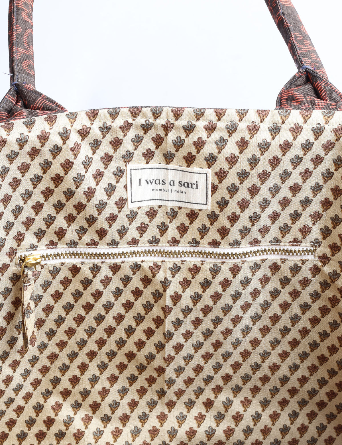 Grey floral patterned work tote bag with padded handles, front view, standing upright on white background