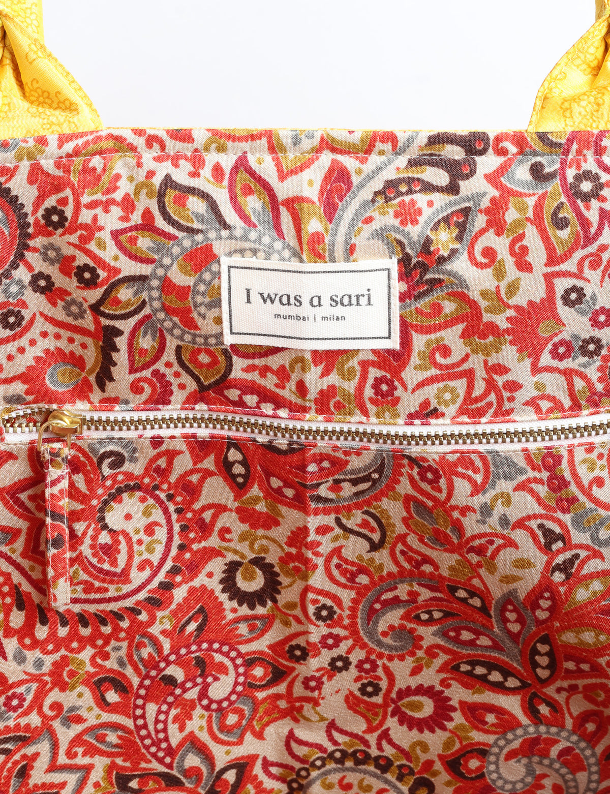 Grey floral patterned work tote bag with padded handles, front view, standing upright on white background