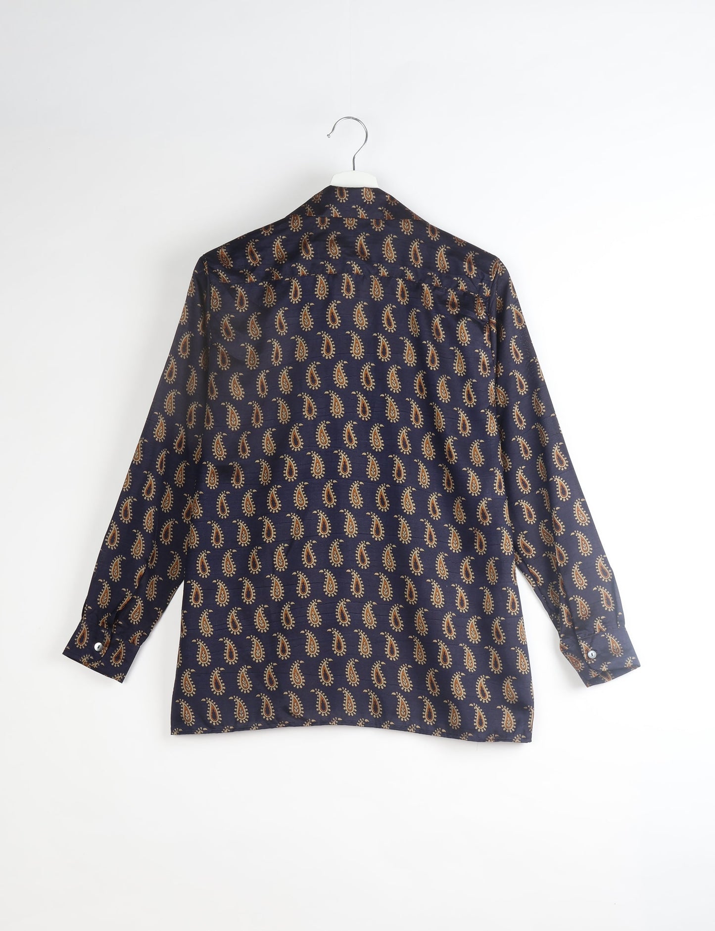 A person wearing a Resort Shirt, a sustainable fashion choice made from recycled materials.