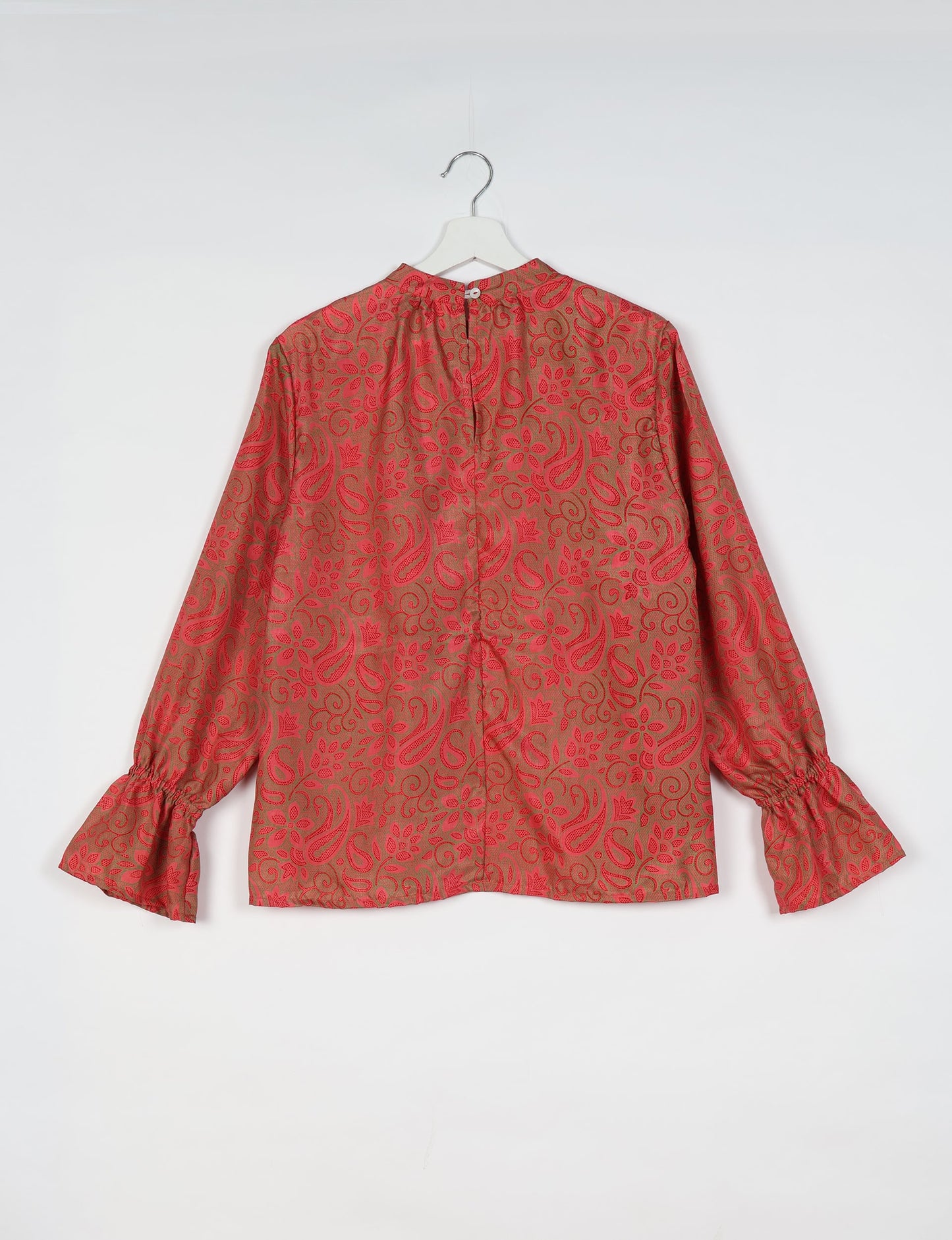 Flowing blouse with peasant sleeves and gathered neckline made from upcycled garments and repurposed clothing, showcasing eco clothing and fair trade fashion in a stylish, comfortable design.