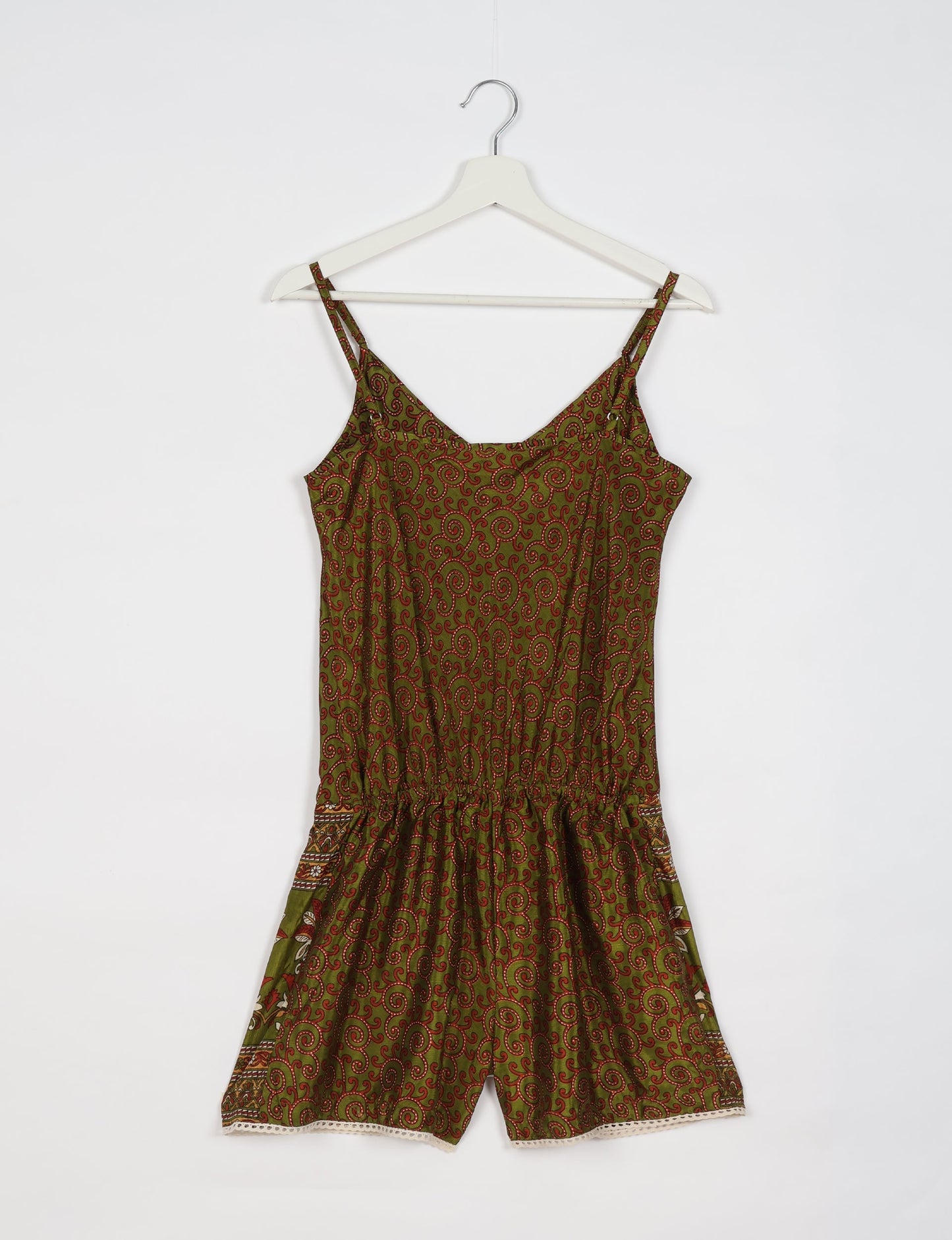 Vibrant playsuit with lace accents, crafted from upcycled saris. Embrace ethical fashion with this unique piece designed for conscious consumers.