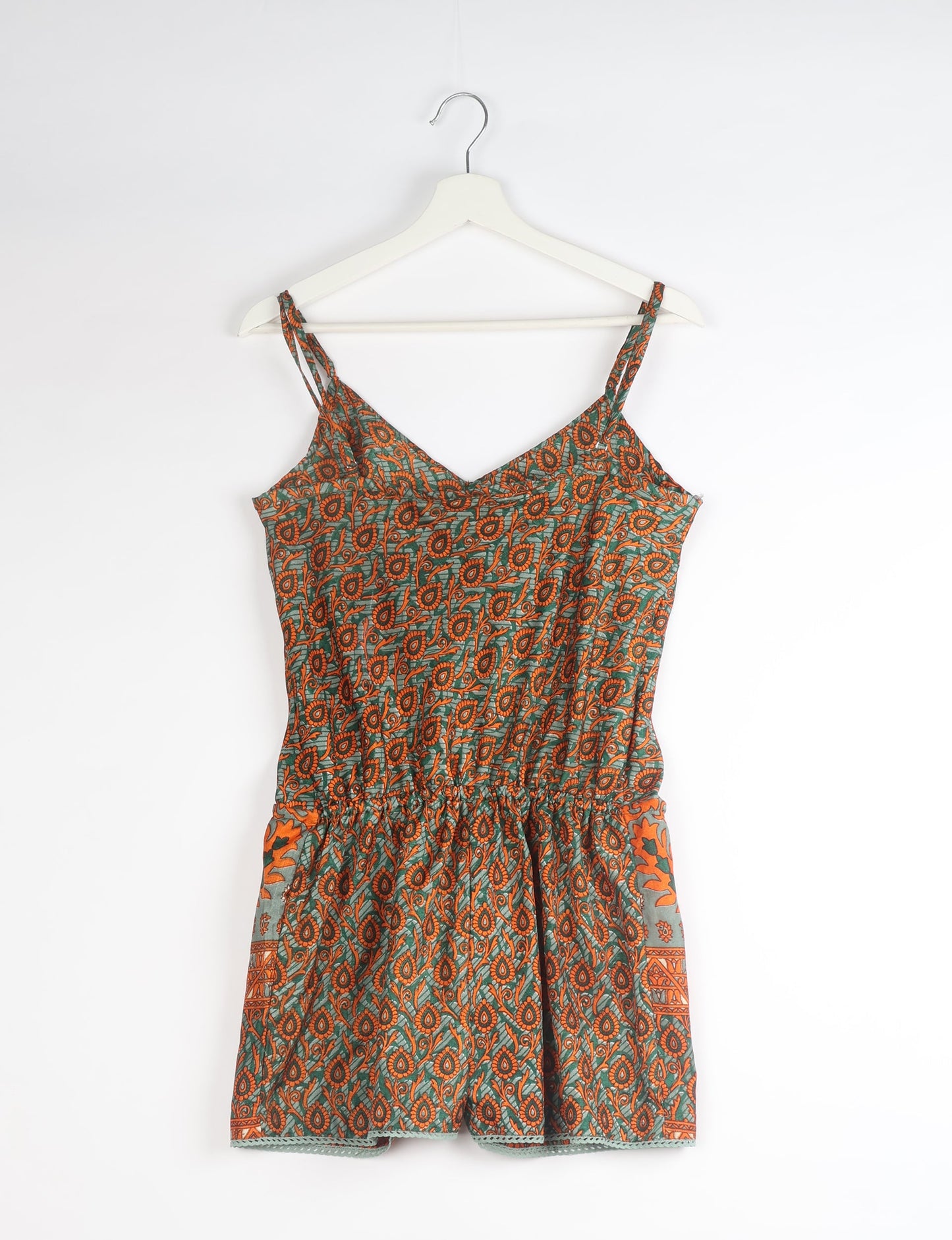 Vibrant playsuit with lace accents, crafted from upcycled saris. Embrace ethical fashion with this unique piece designed for conscious consumers.