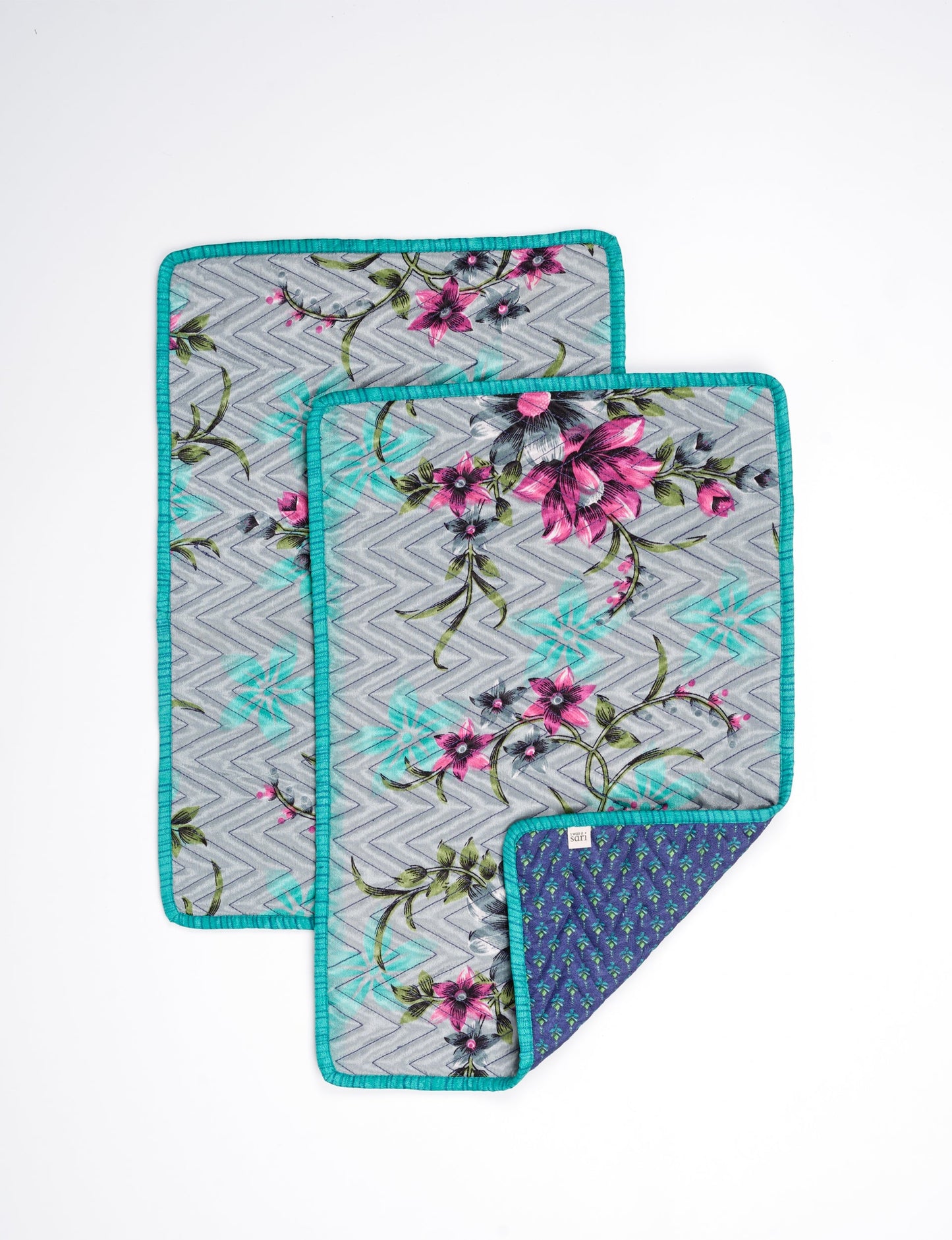 Quilted rectangular placement set of 2 made from upcycled saris and cotton canvas, eco-friendly dining accessories for ethical consumers.