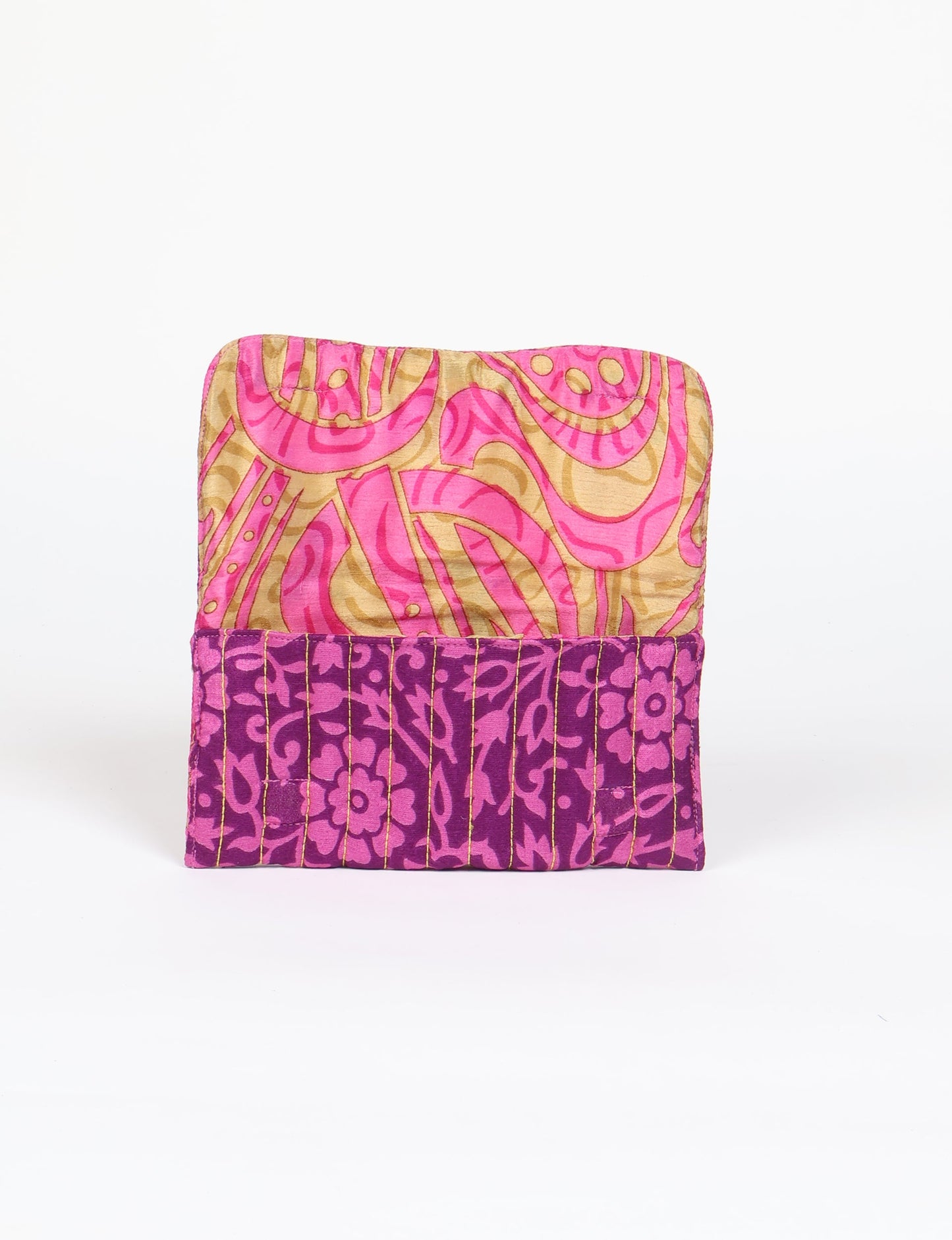 Quilted sunglasses case made from recycled sari products, featuring a secure magnetic closure. A chic example of ethical fashion, conscious clothing, and carbon neutral fashion. Protect your sunglasses while embracing circular fashion and upcycled garments.